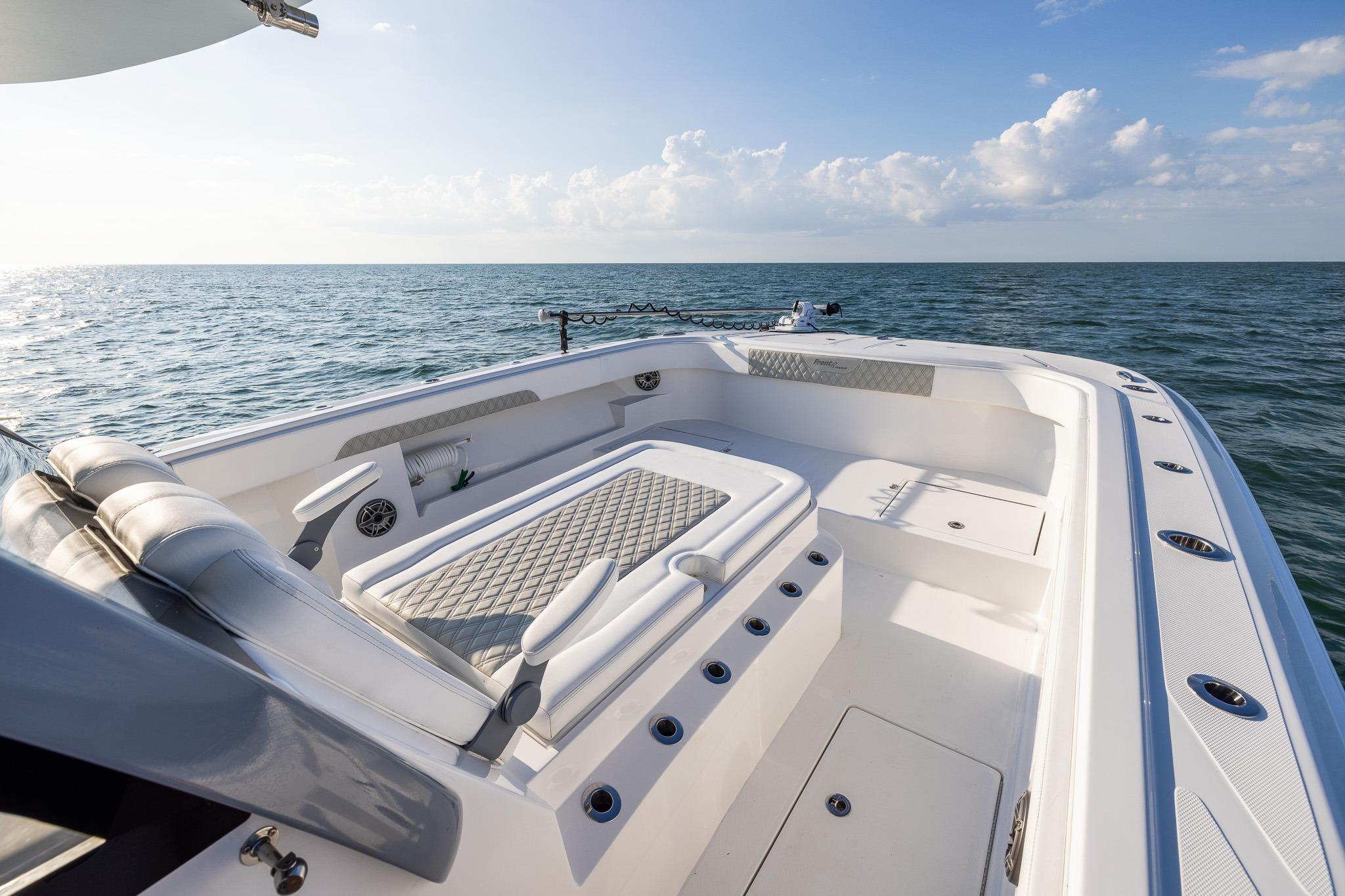 Luxurious 2026 Front Runner 37 Catamaran on open sea, featuring spacious deck seating.