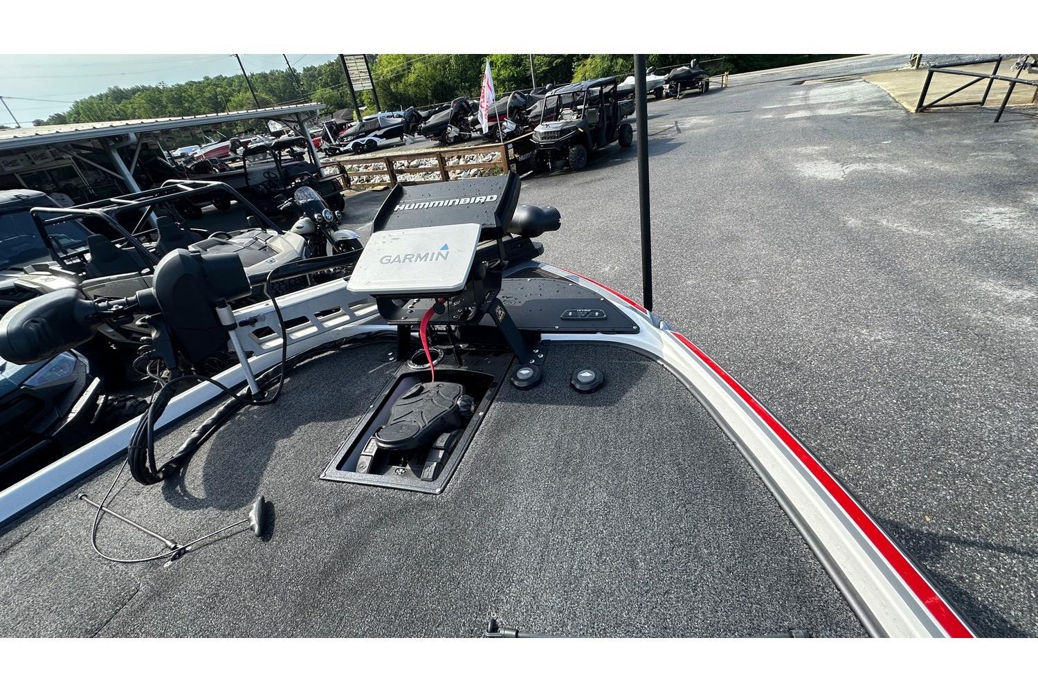 2023 Nitro Z20 Pro boat deck with Garmin and Humminbird electronics, parked outdoors.
