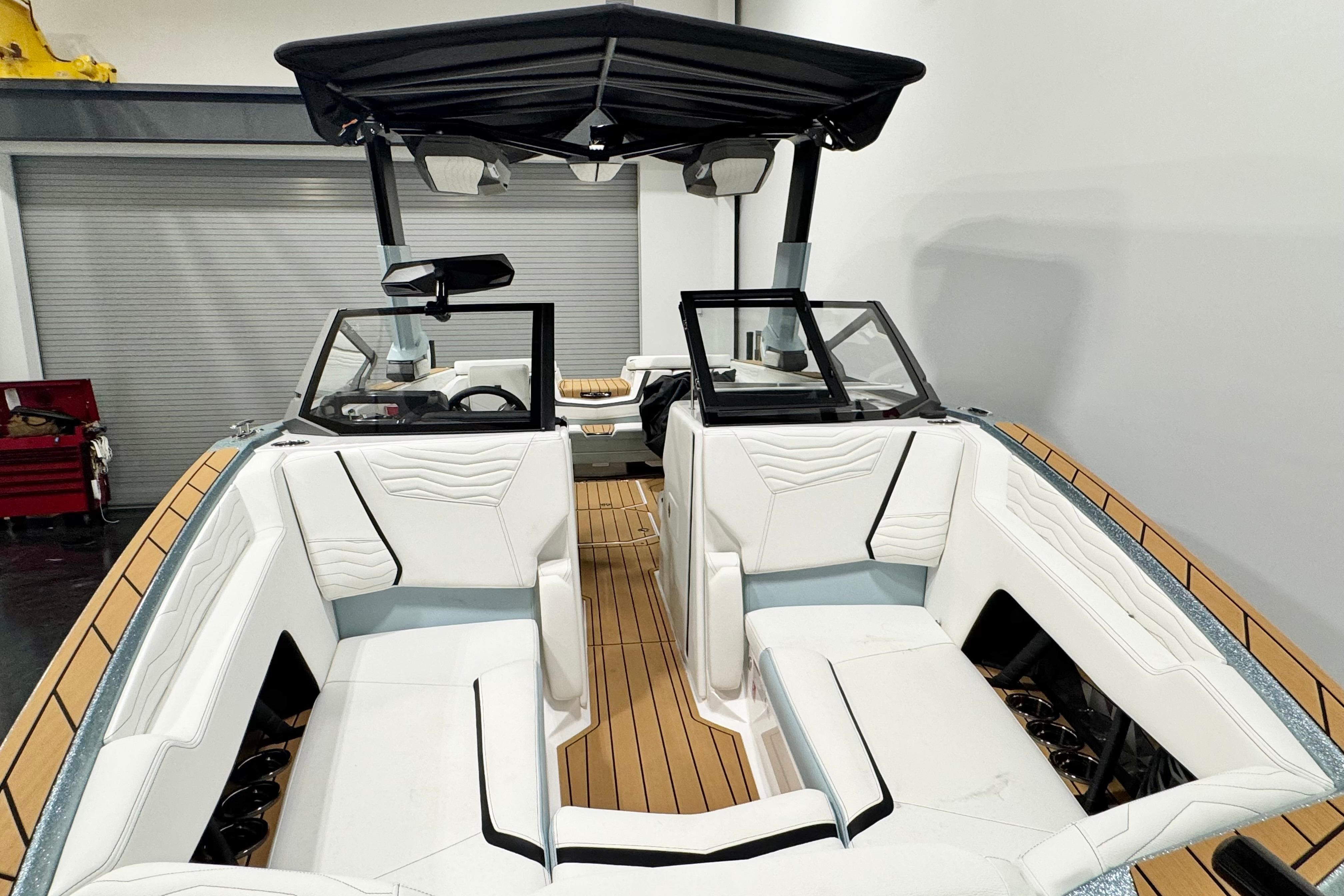 2026 Nautique Super Air Nautique G23 Paragon interior with white seating and sleek design.