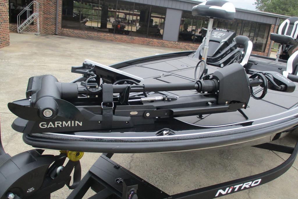 2026 Tracker Pro Guide V-16 WT boat with Garmin trolling motor on trailer.