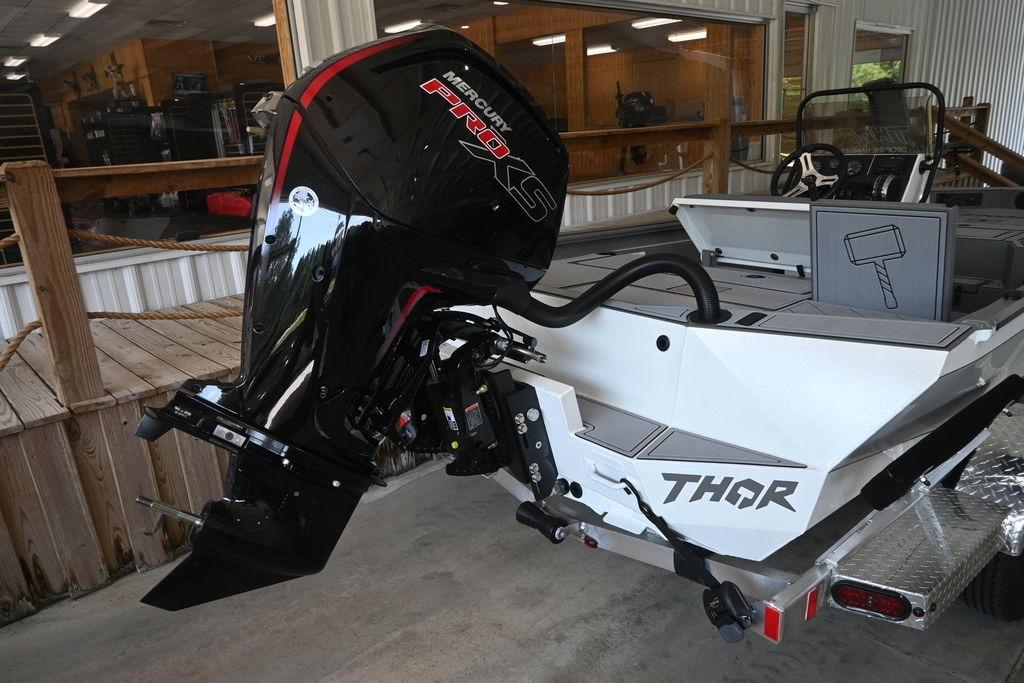2026 Thor Lake Hammer 1900CC boat with Mercury Pro XS engine in showroom.