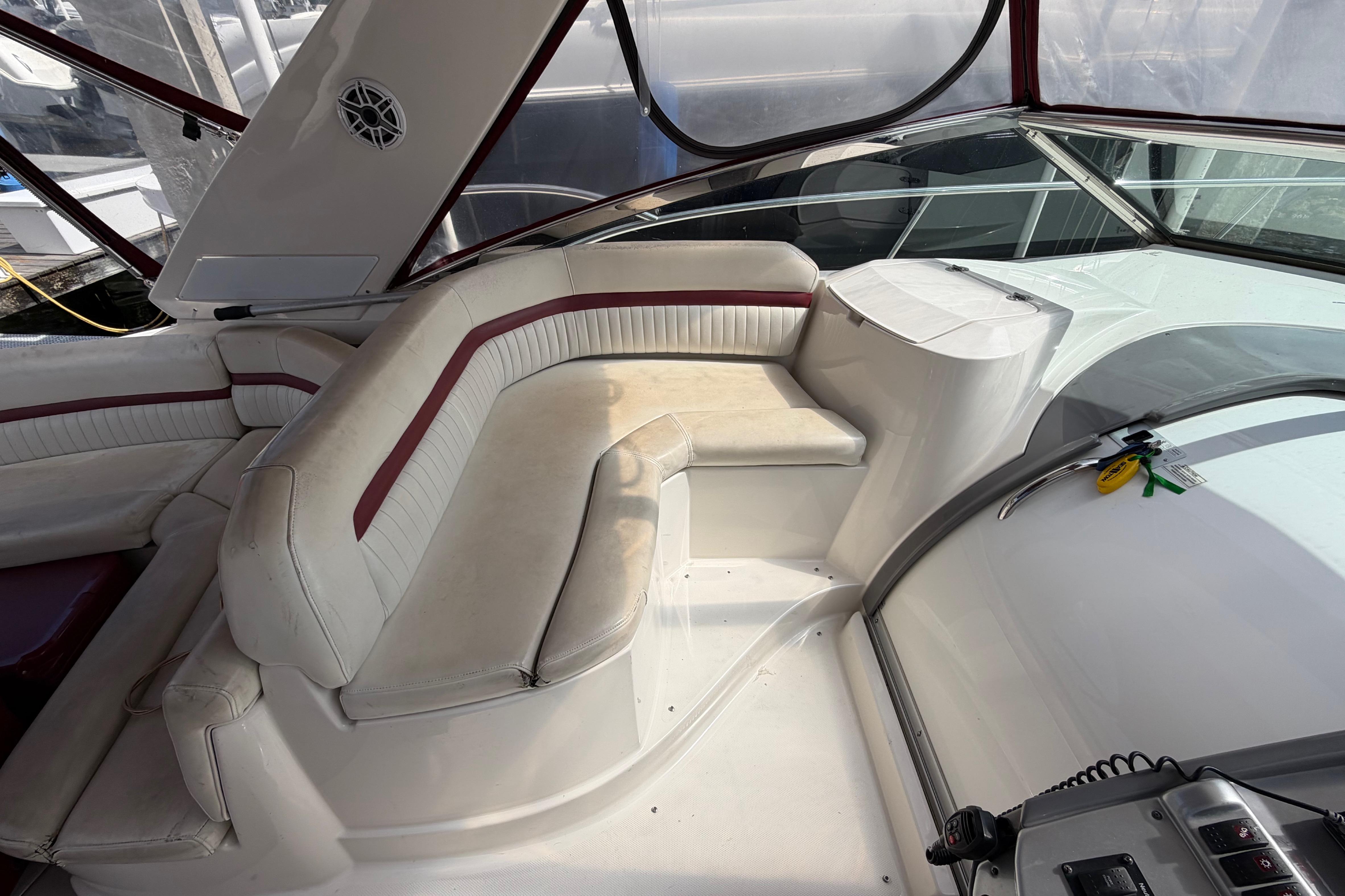 2007 Monterey 350 Sport Yacht interior with white and red seating, modern design.