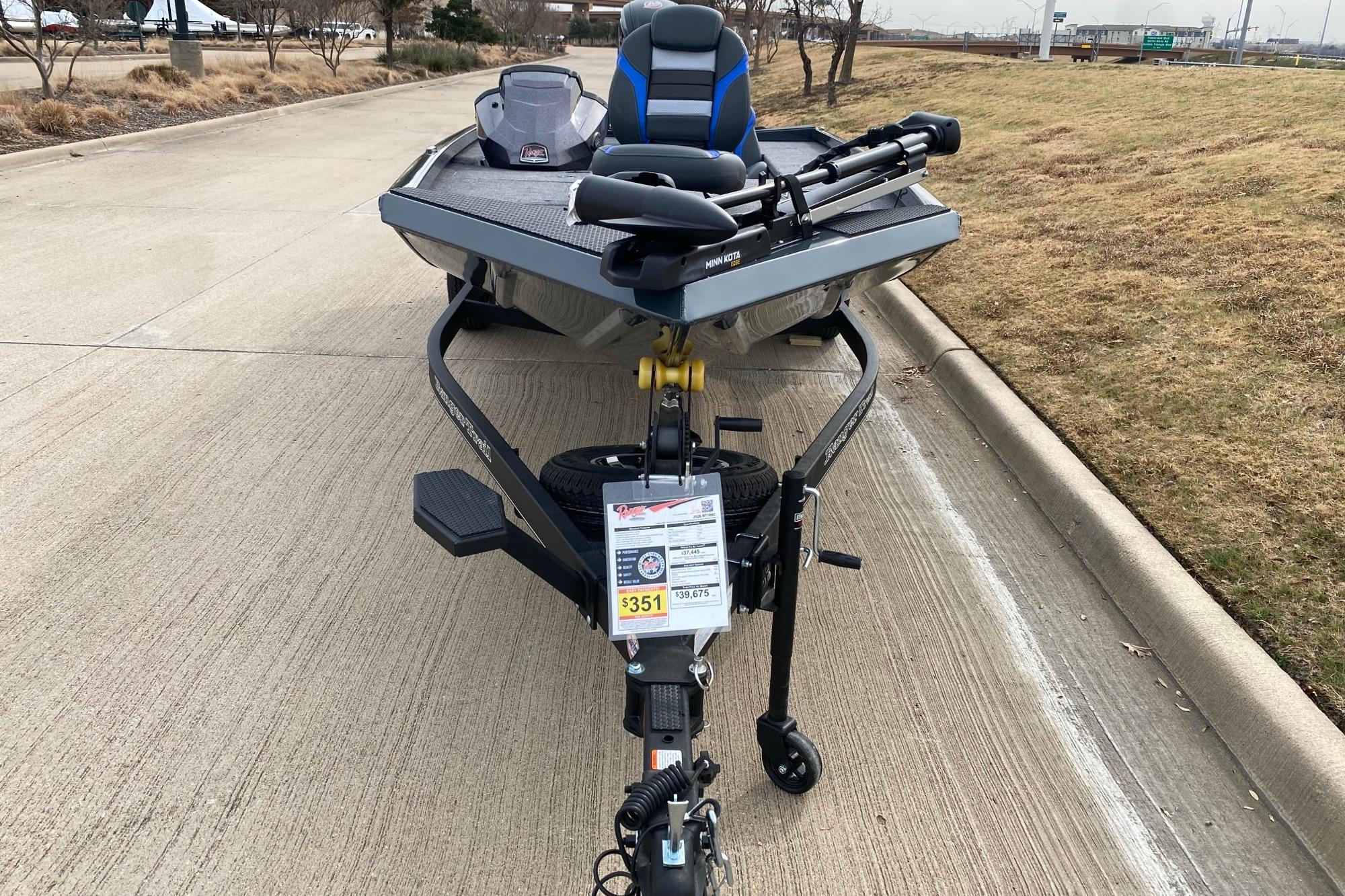 2026 Ranger RT188C boat on trailer, parked on a concrete surface.