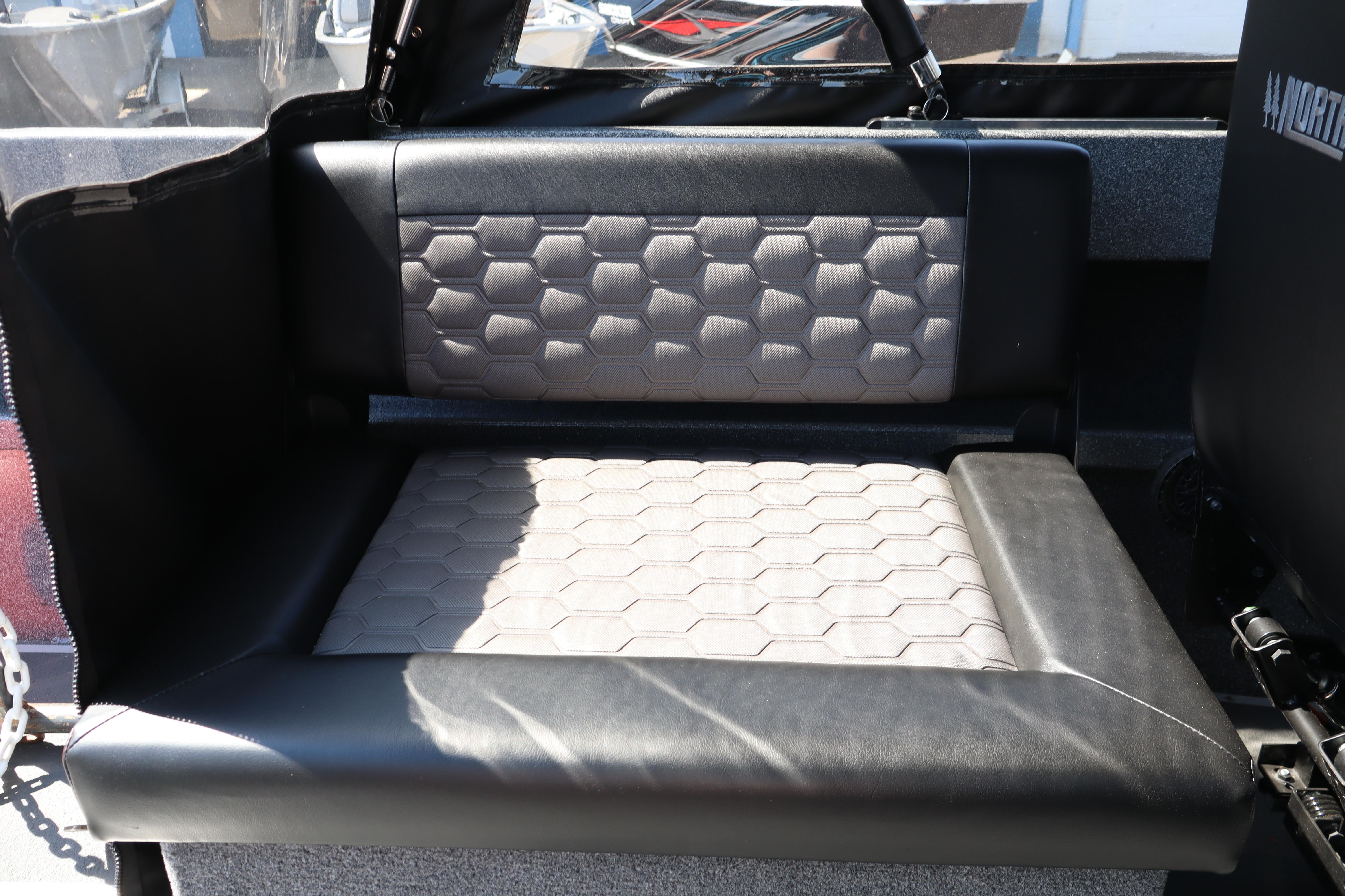 2025 NorthRiver SEAHAWK boat seat with hexagonal pattern and black leather trim.