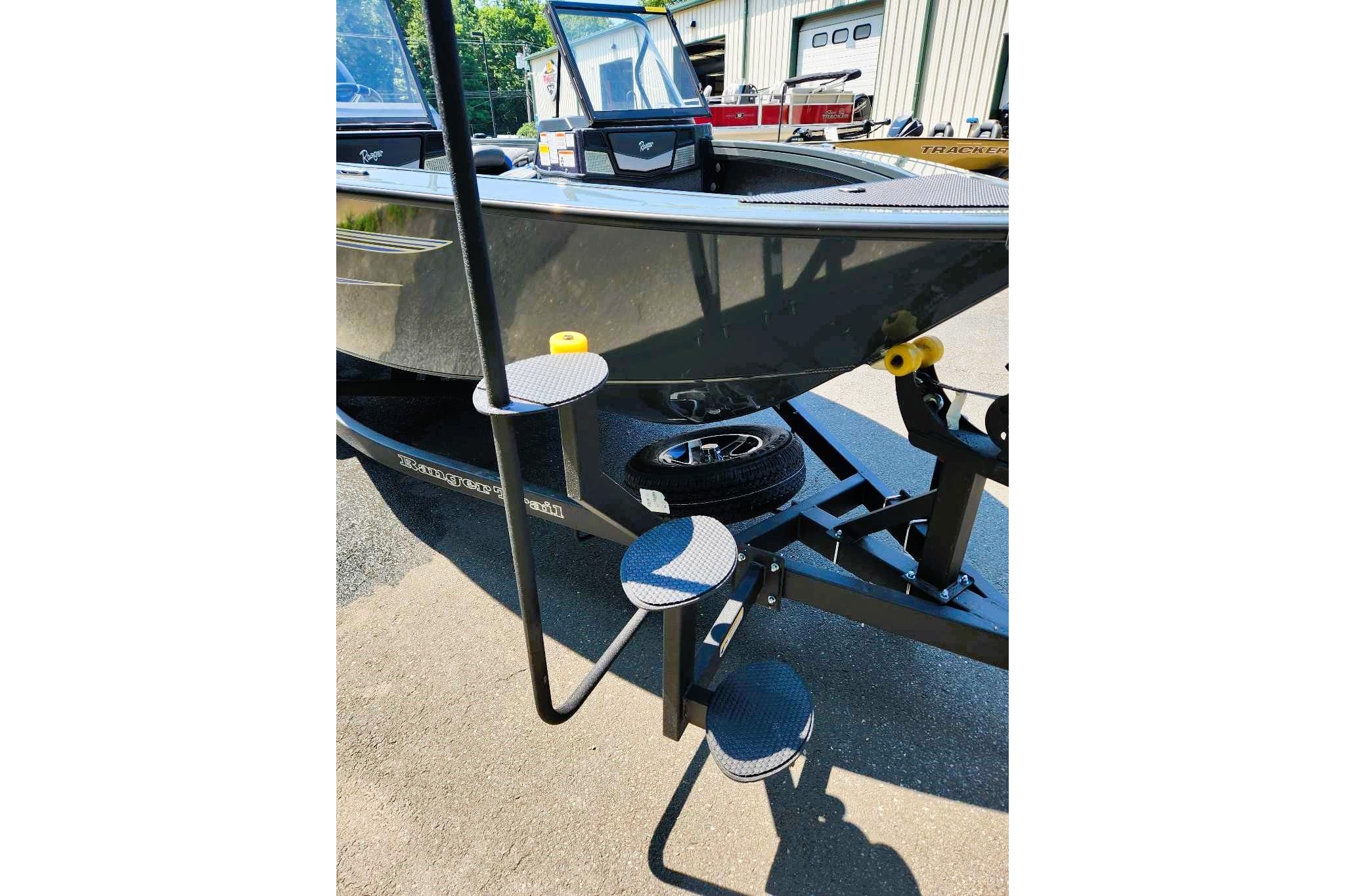 2026 Ranger VX1988 WT boat on trailer with step ladder, parked outdoors.