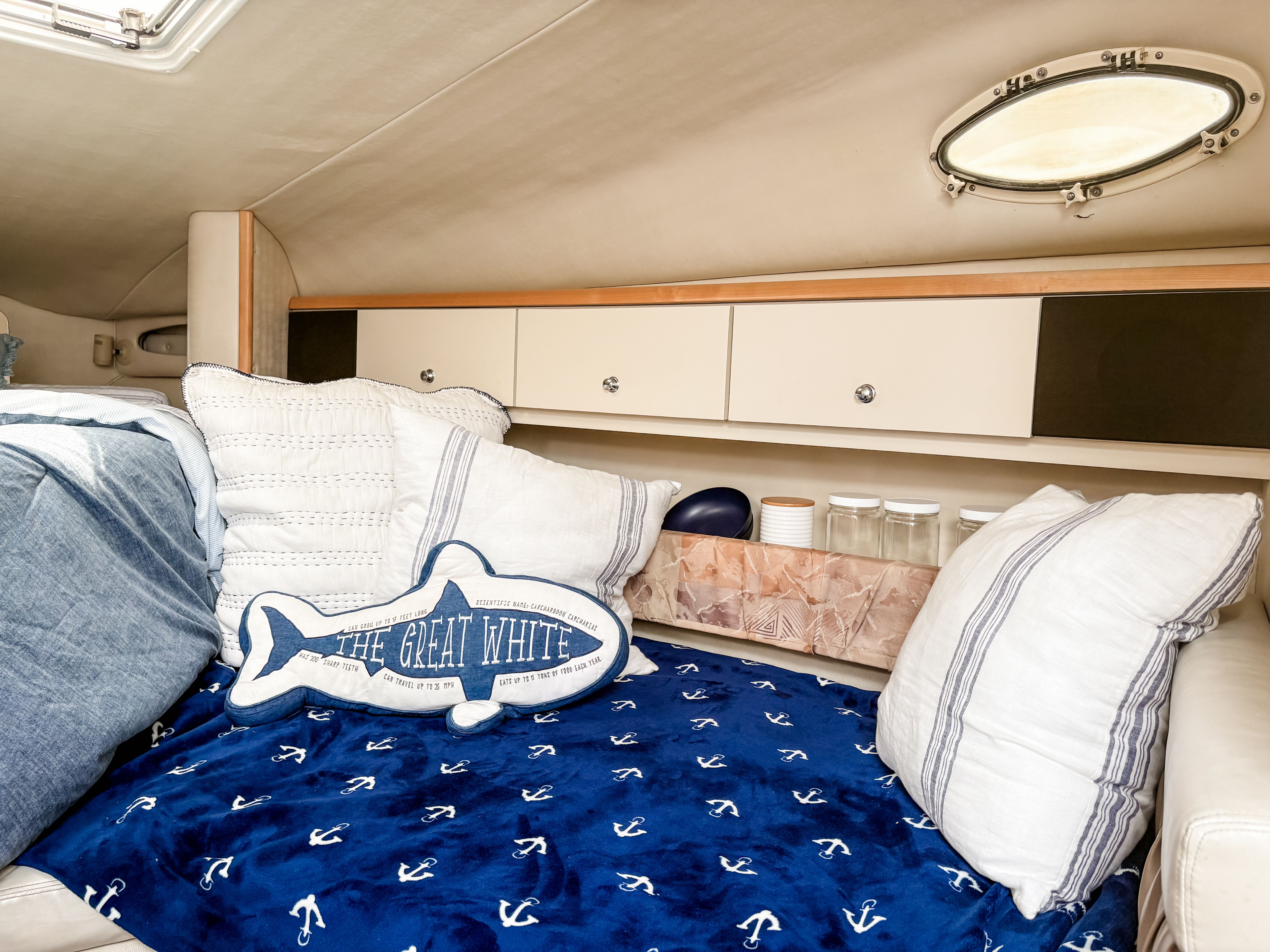 Interior of a 1997 Wellcraft Martinique with nautical decor.