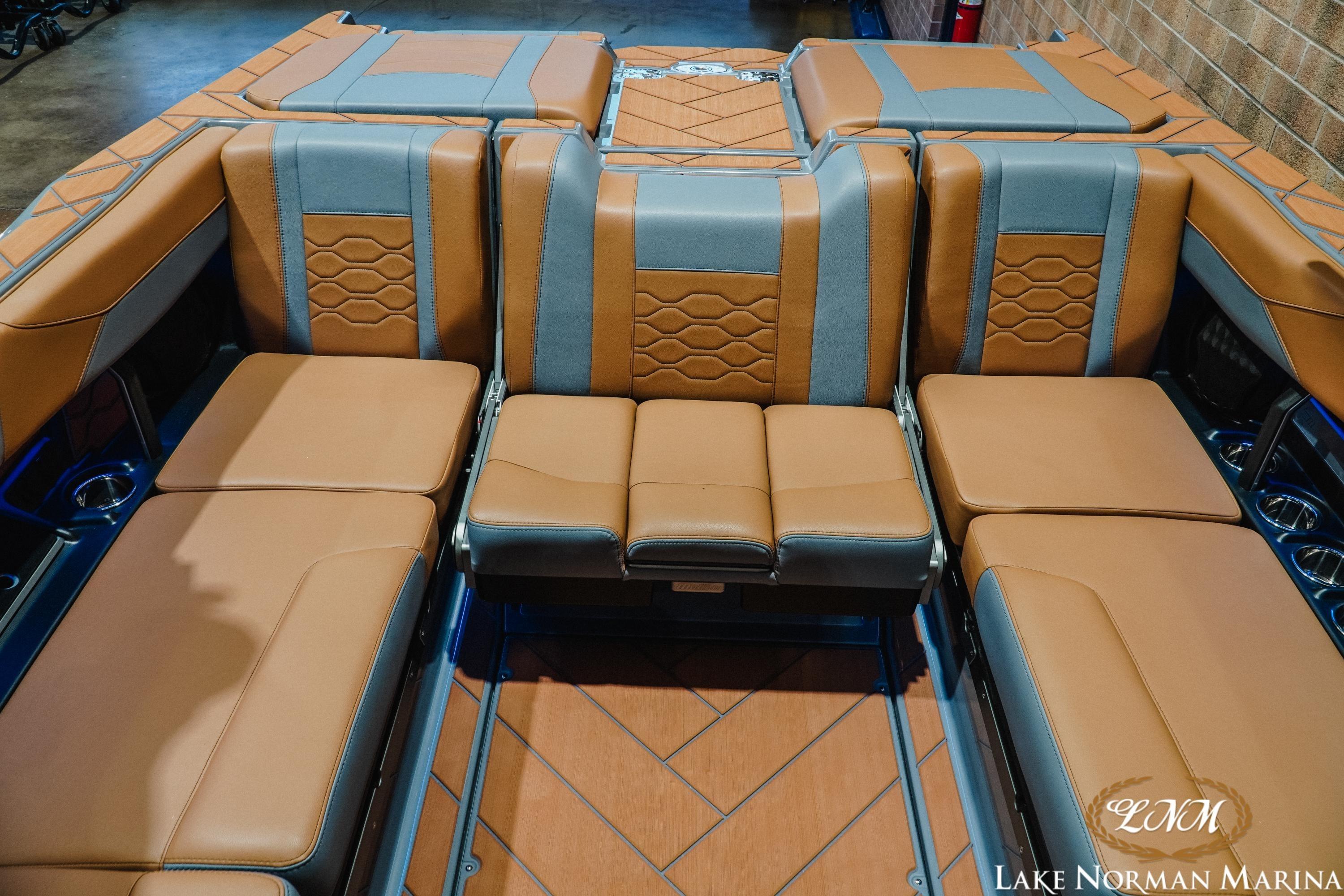 2026 Malibu Wakesetter 23 LSV interior with luxurious tan and gray seating.