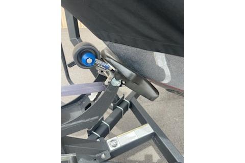 2023 Nitro ZV19 Sport trailer detail with secure locking mechanism and blue wheel.
