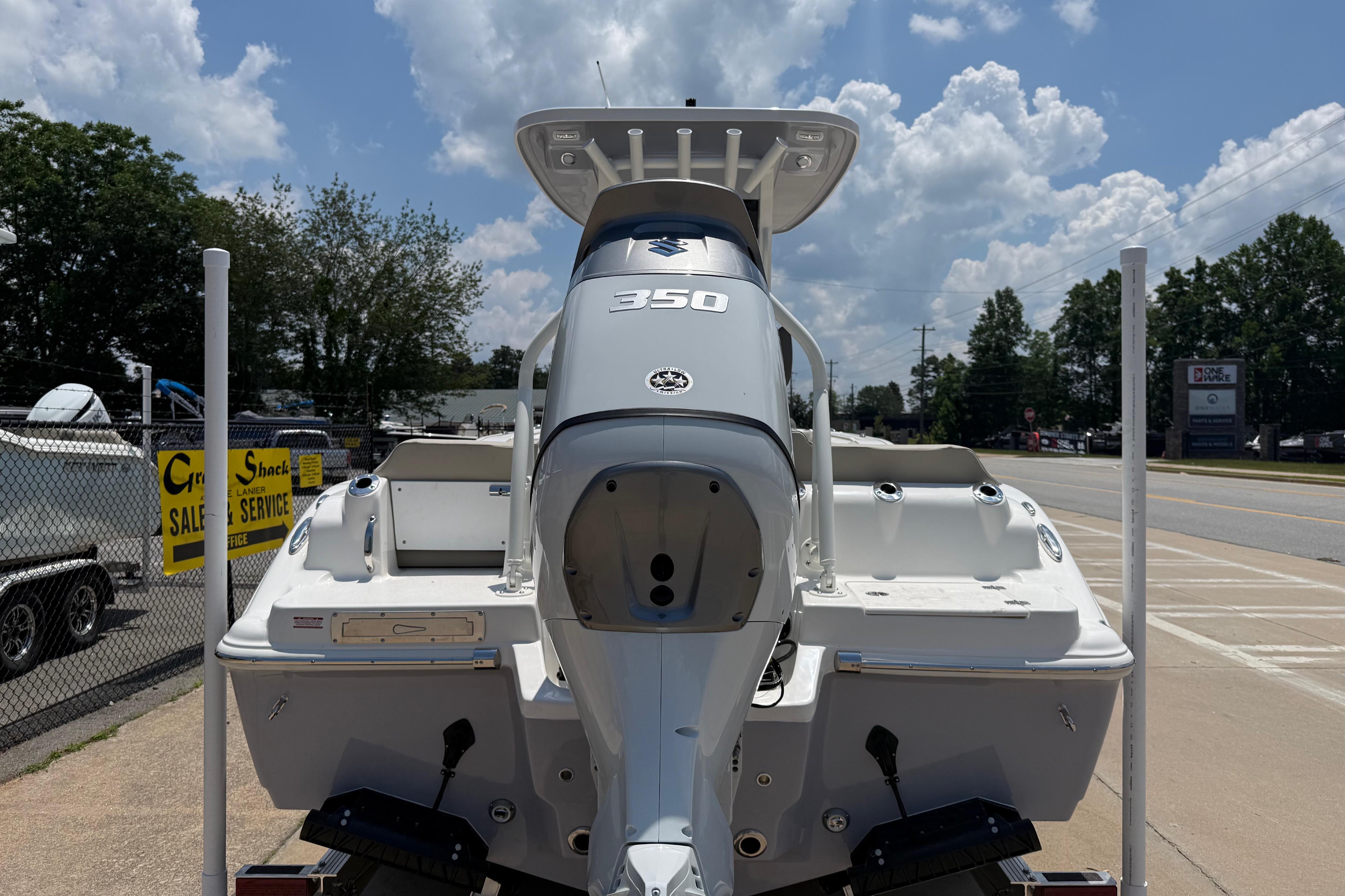 2027 Key West 249 FS boat with powerful 350 engine, parked outdoors.