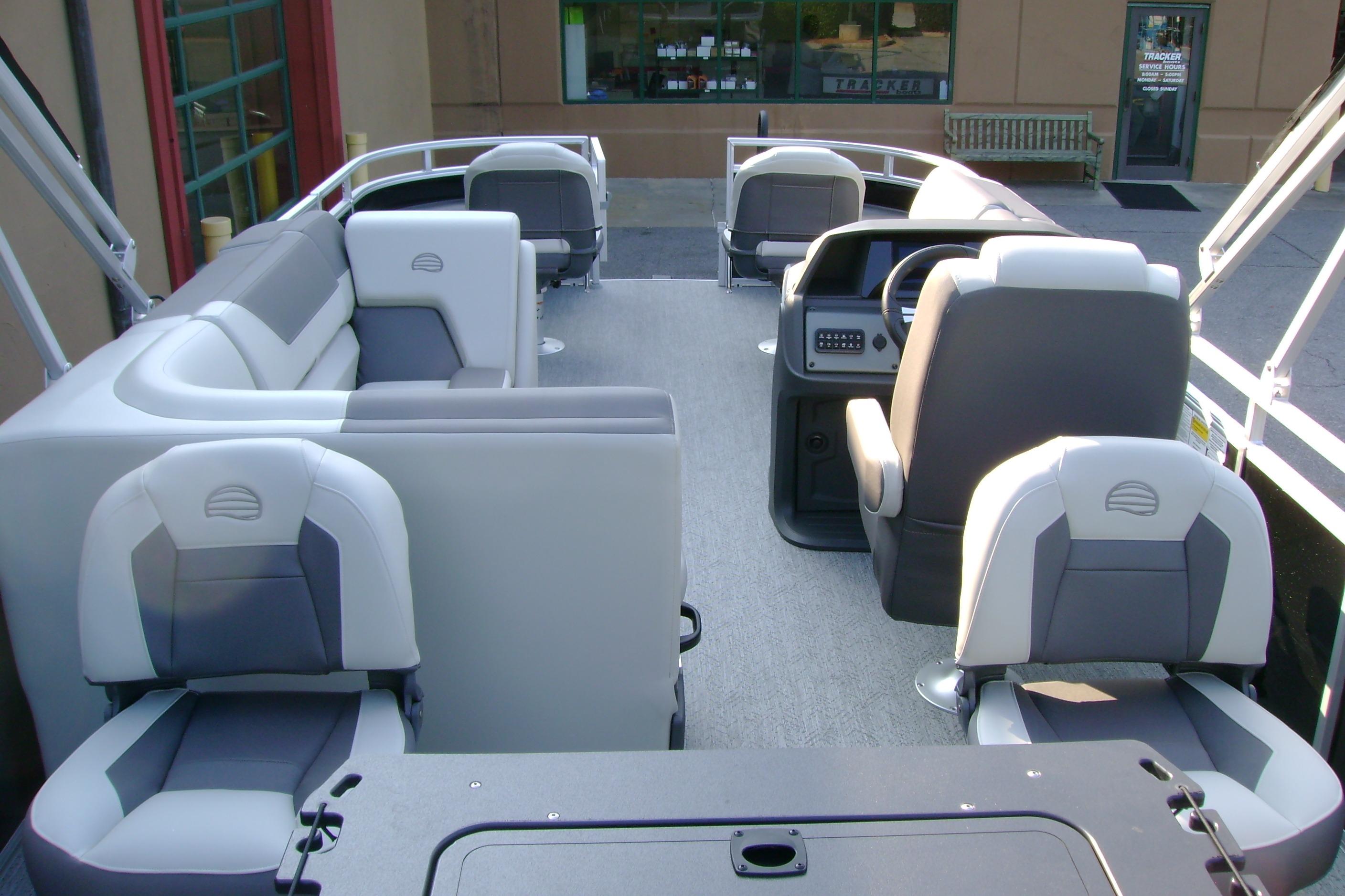 2026 Sun Tracker Fishin' Barge 20 DLX interior with comfortable seating and modern design.