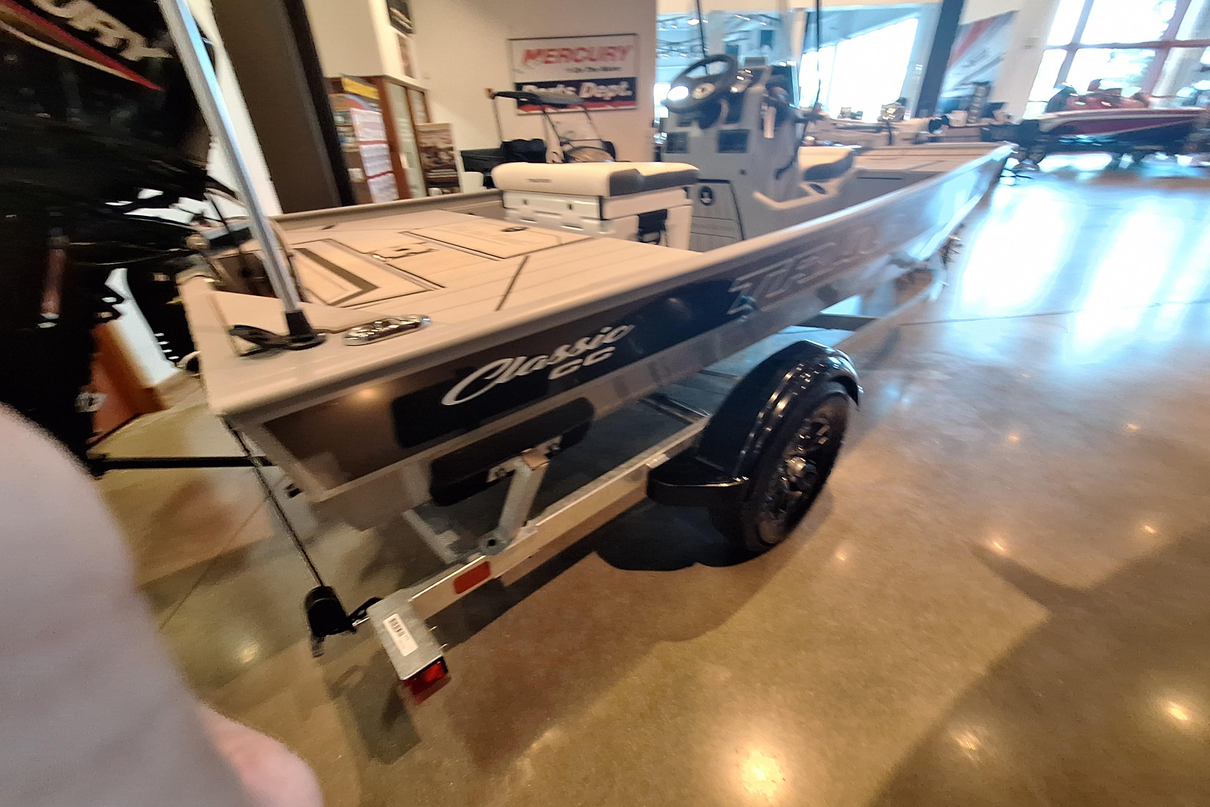 2026 Tracker Bass Tracker Classic CC boat on display in showroom.
