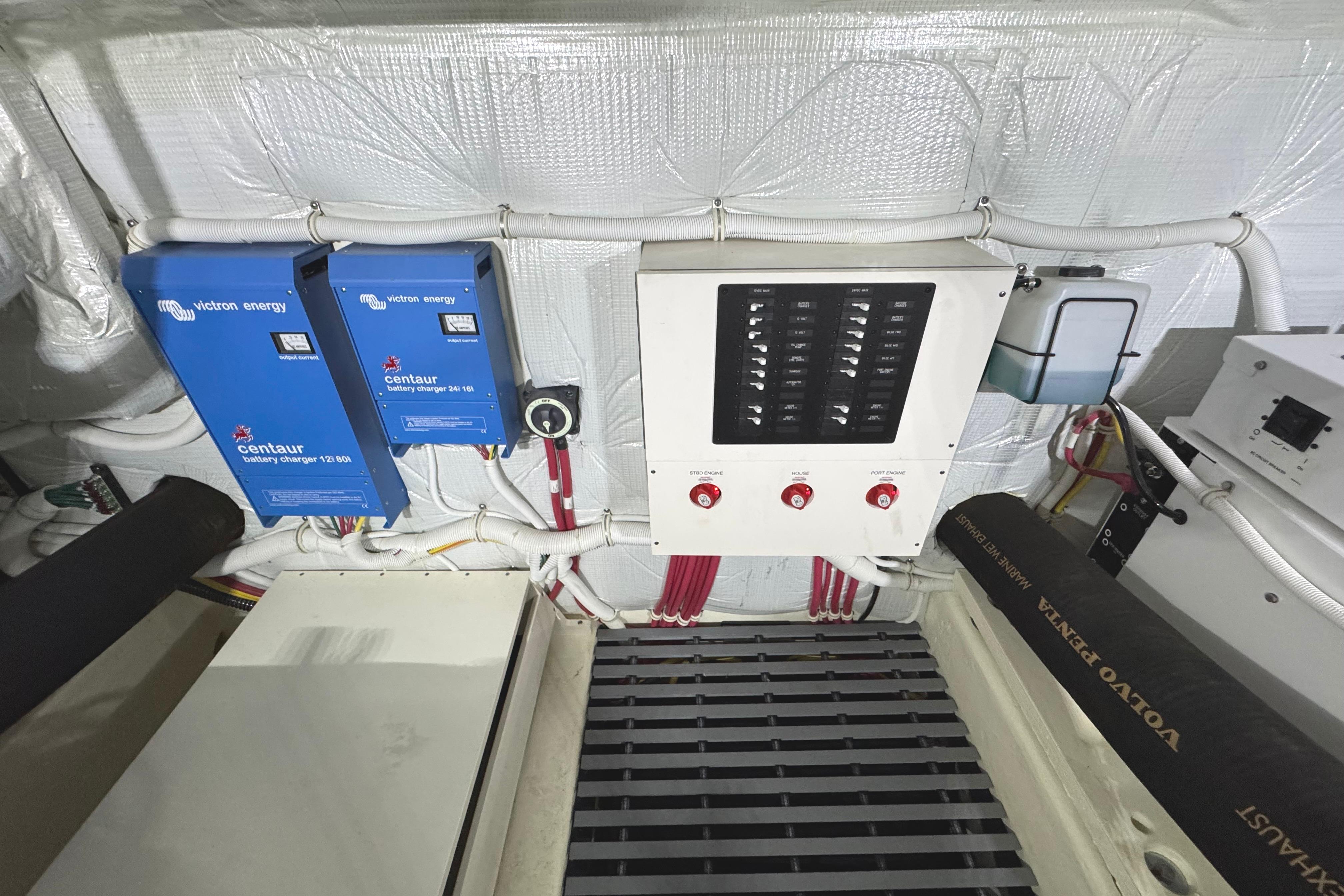 Engine room of 2020 Tiara Yachts C49 Coupe with Victron Energy chargers.