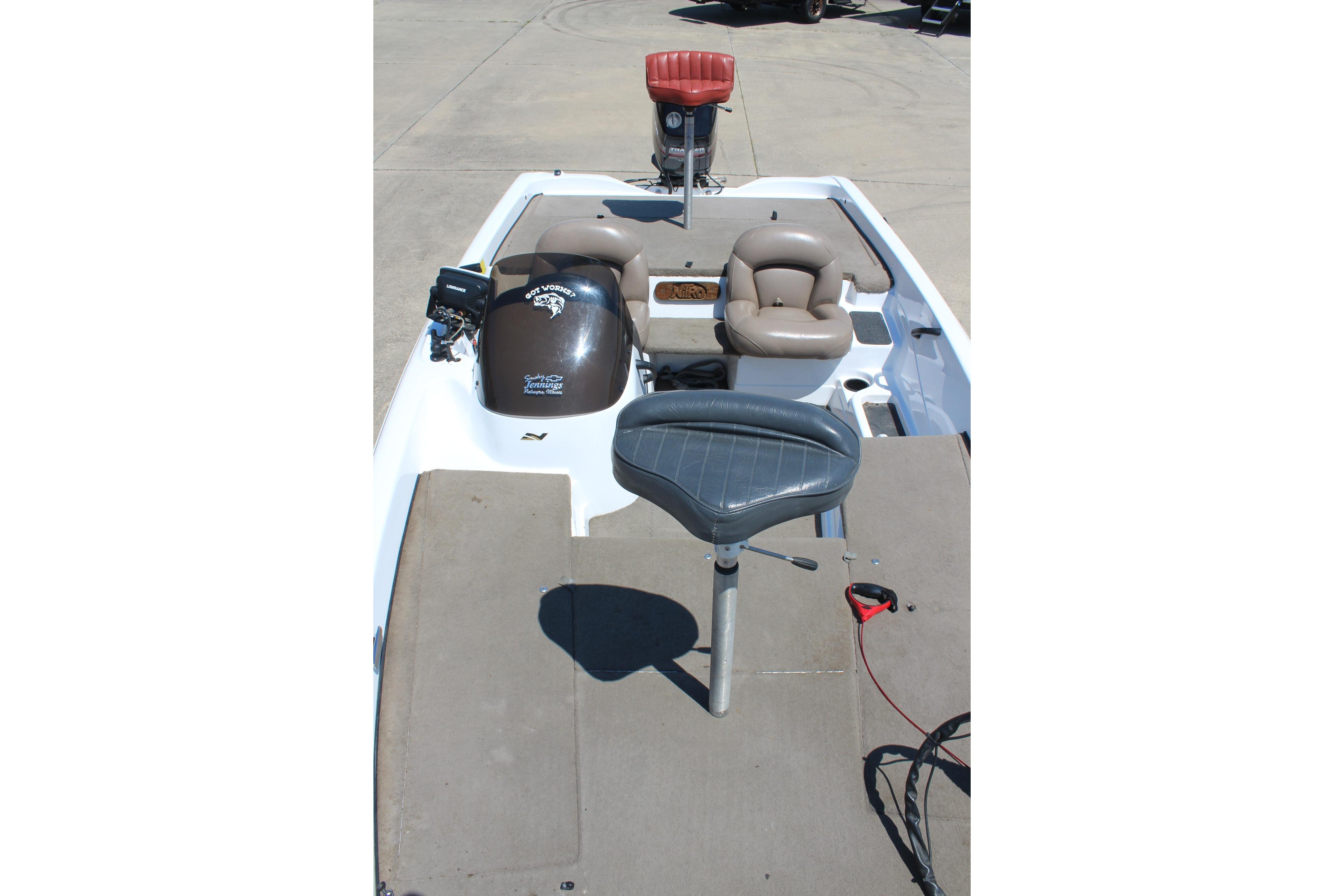 2003 Nitro NX 750 SC boat interior with seating and control panel.