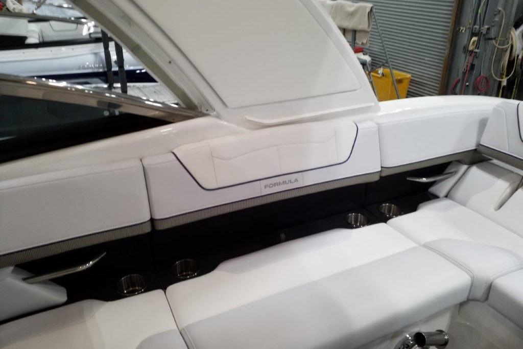 2021 Formula 350 Sun Sport boat interior with white seating and sleek design.