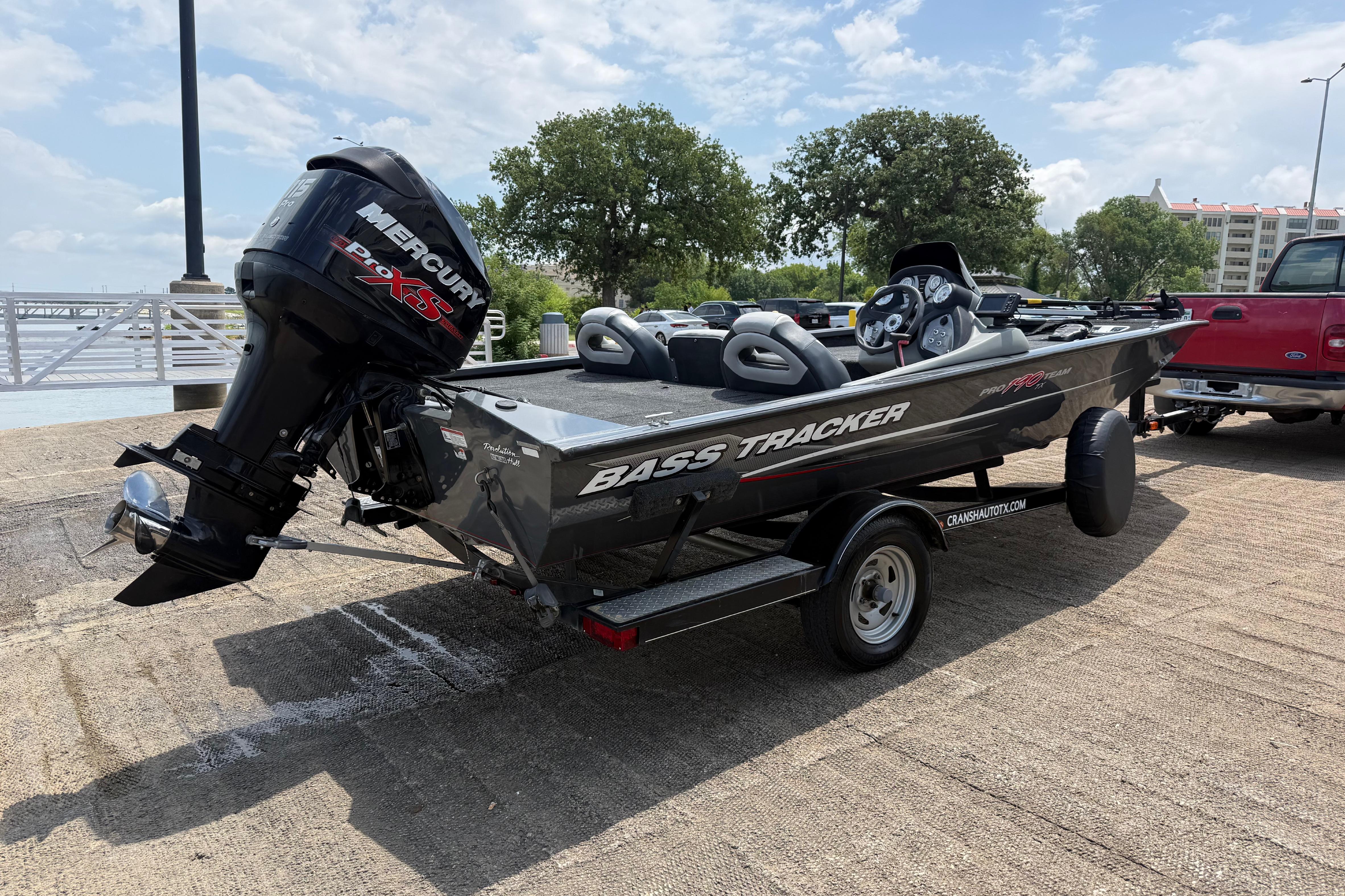 2015 Tracker Pro Team 190 TX bass boat with Mercury engine on trailer.