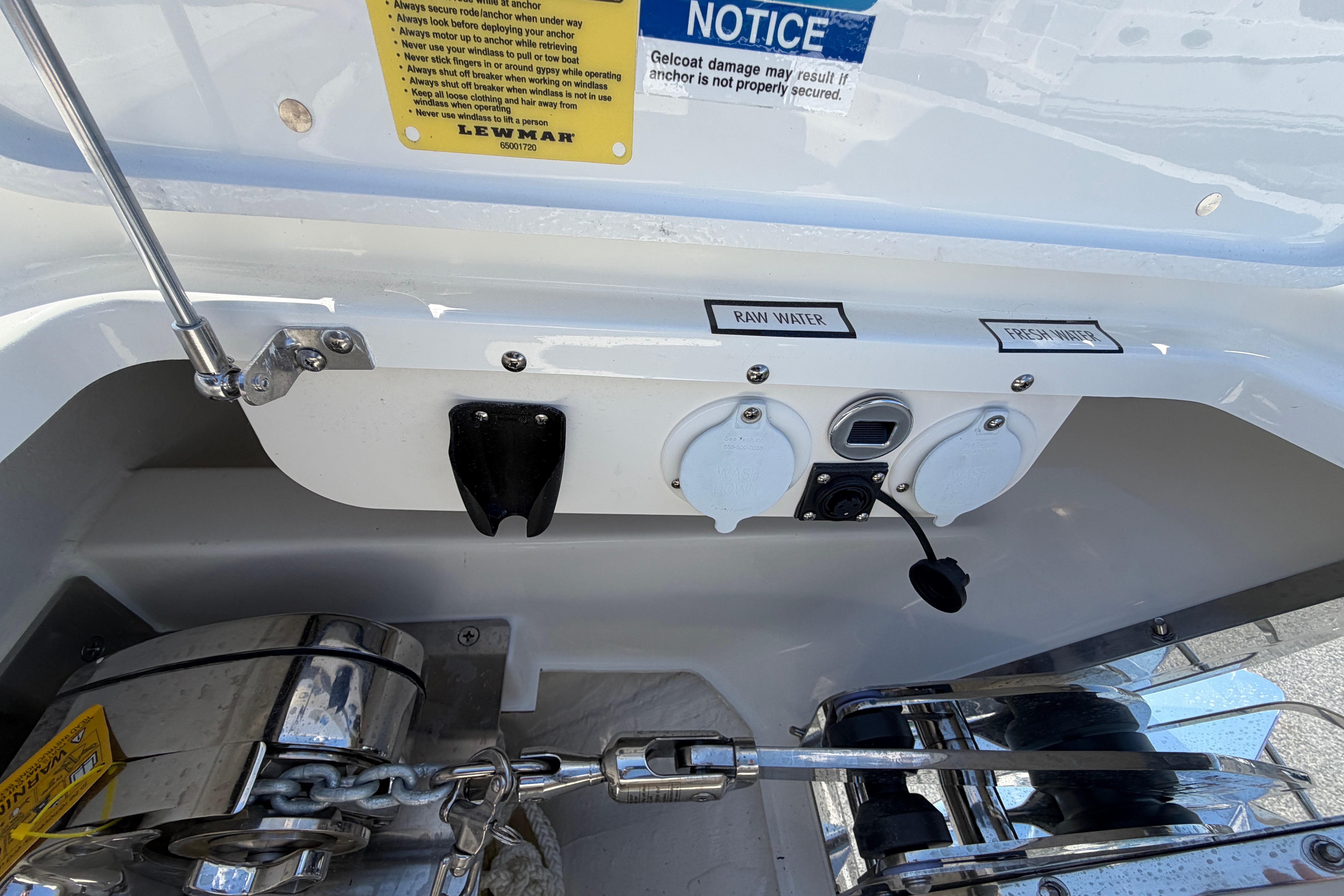 Control panel of 2026 Pursuit S 358 Sport boat with water connections.
