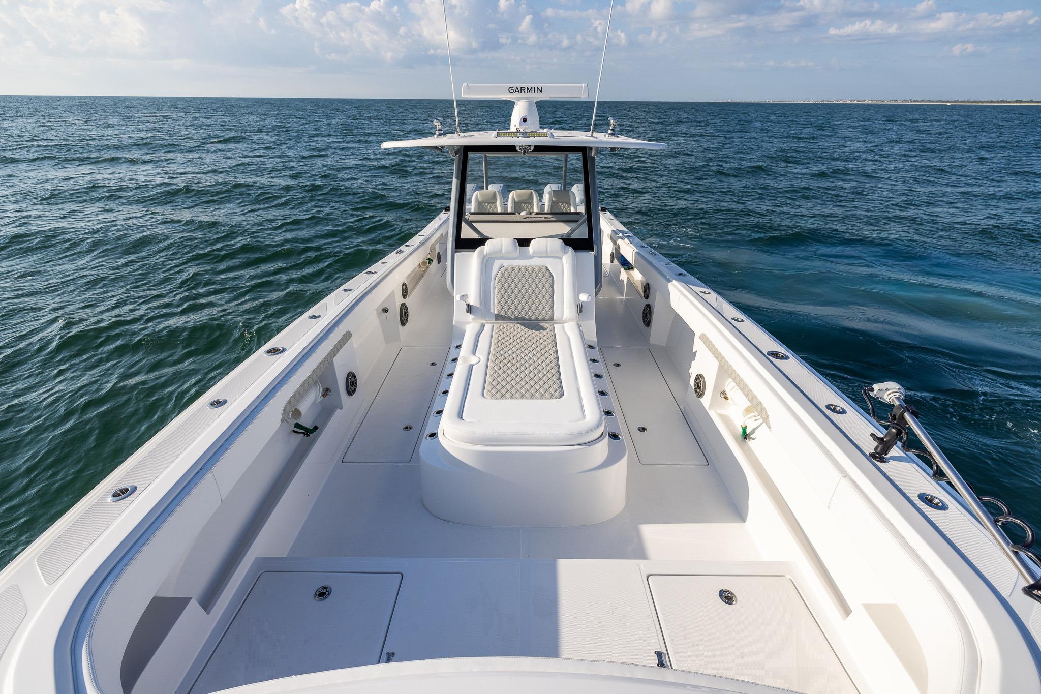 2026 Front Runner 37 Catamaran on open sea, showcasing spacious deck and sleek design.