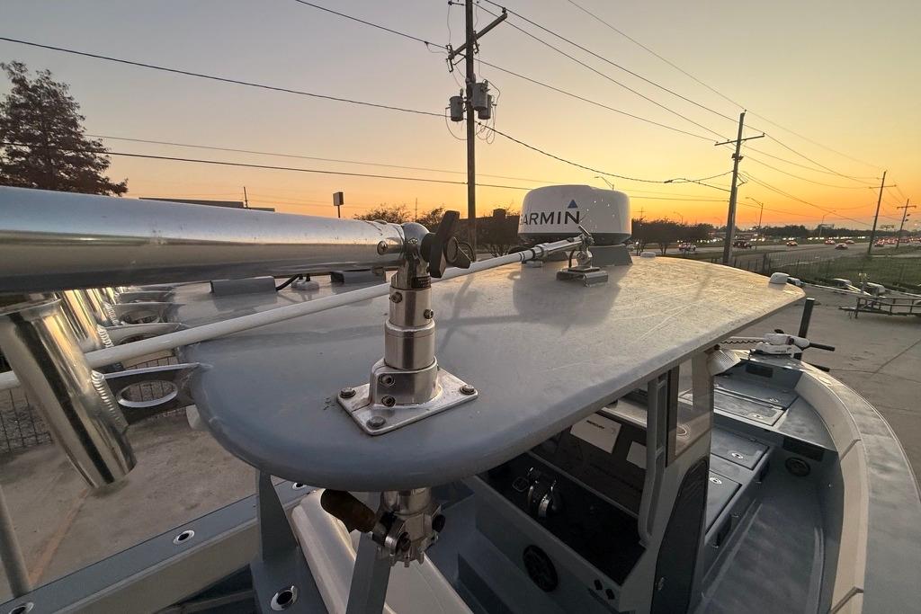 2019 Metal Shark 28 CC boat with Garmin equipment at sunset.