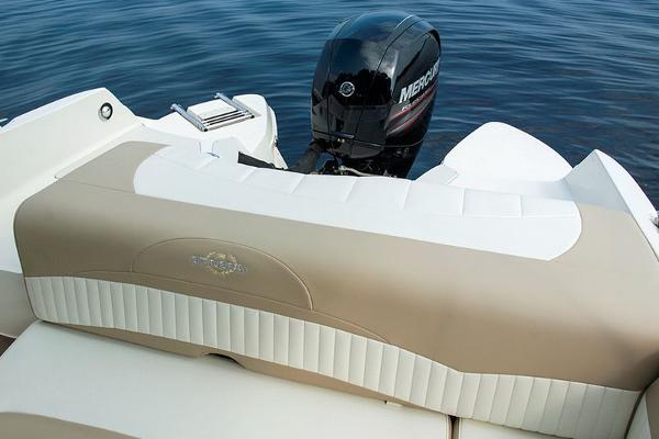 Manufacturer Provided Image: 2018 Stingray 214 LR boat with Mercury outboard motor on water.