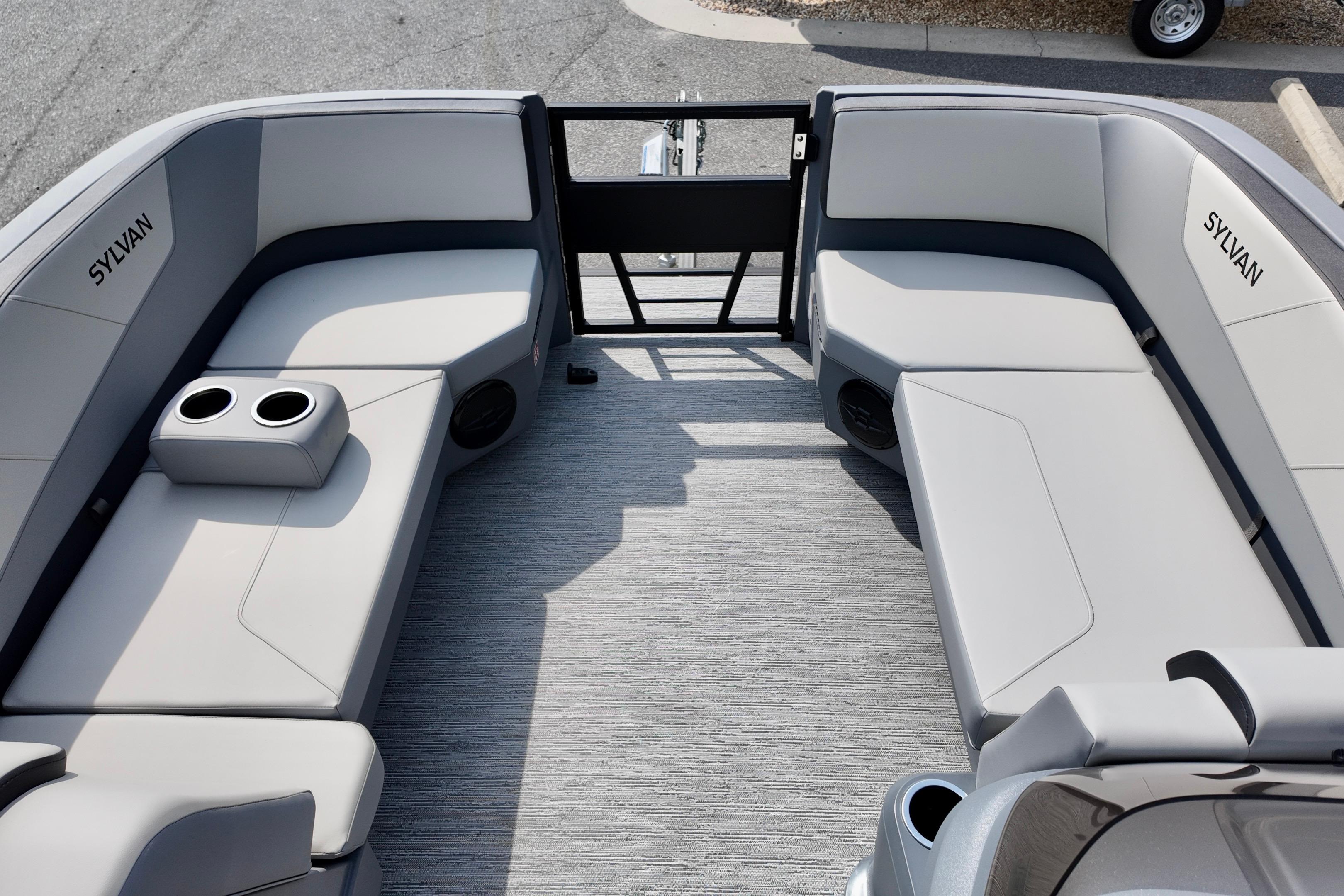 2026 Sylvan A-20 LZ DH boat interior with gray seating and cup holders.