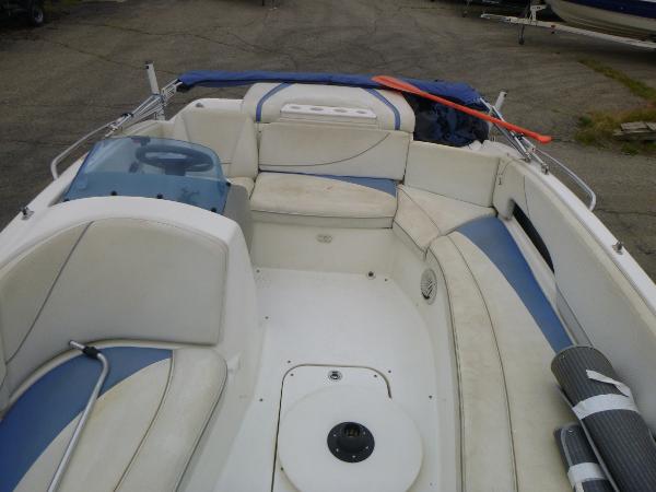 2007 Bayliner 197 Deck Boat interior with white and blue seating.
