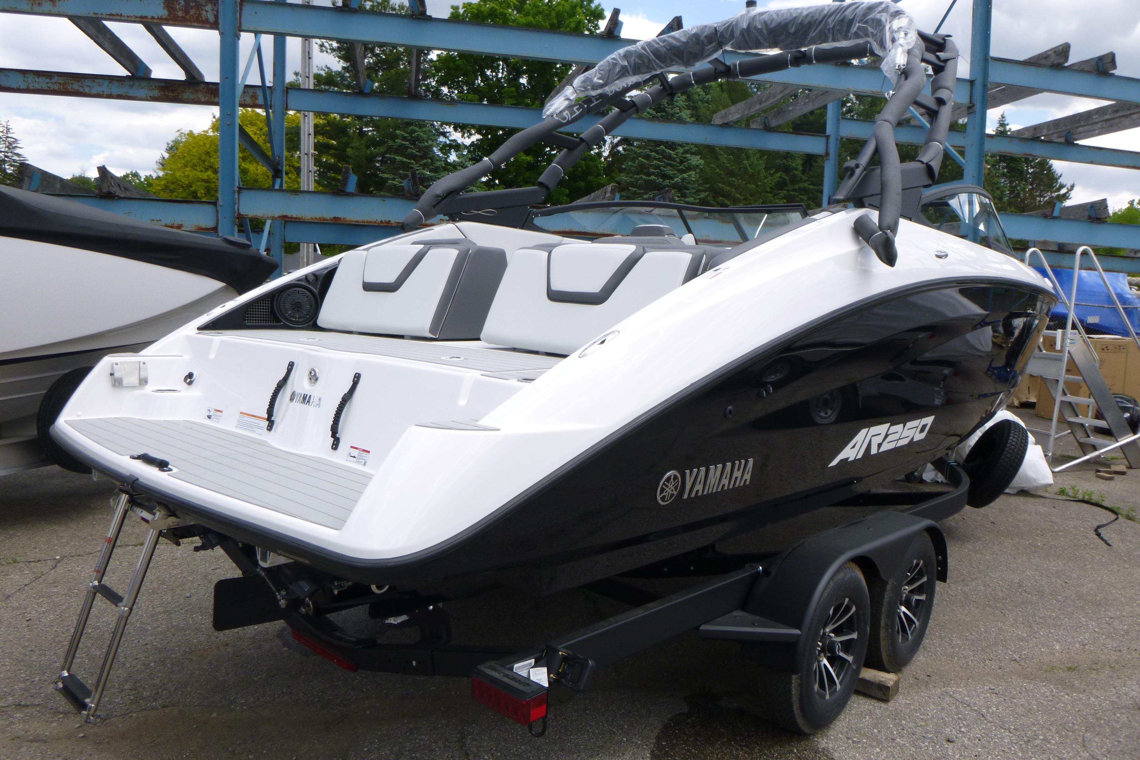 2026 Yamaha Boats AR250 on trailer, sleek design, ready for water adventures.