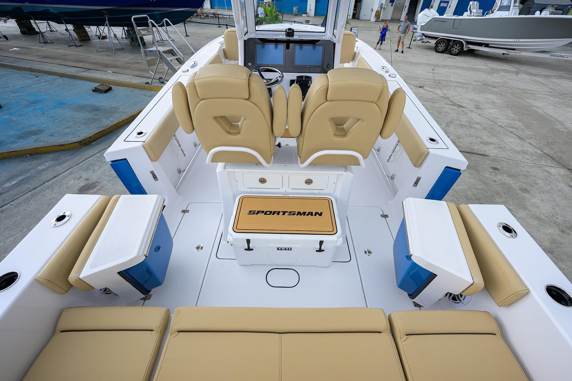 2026 Sportsman Heritage 261 Center Console boat interior with beige seating and modern design.