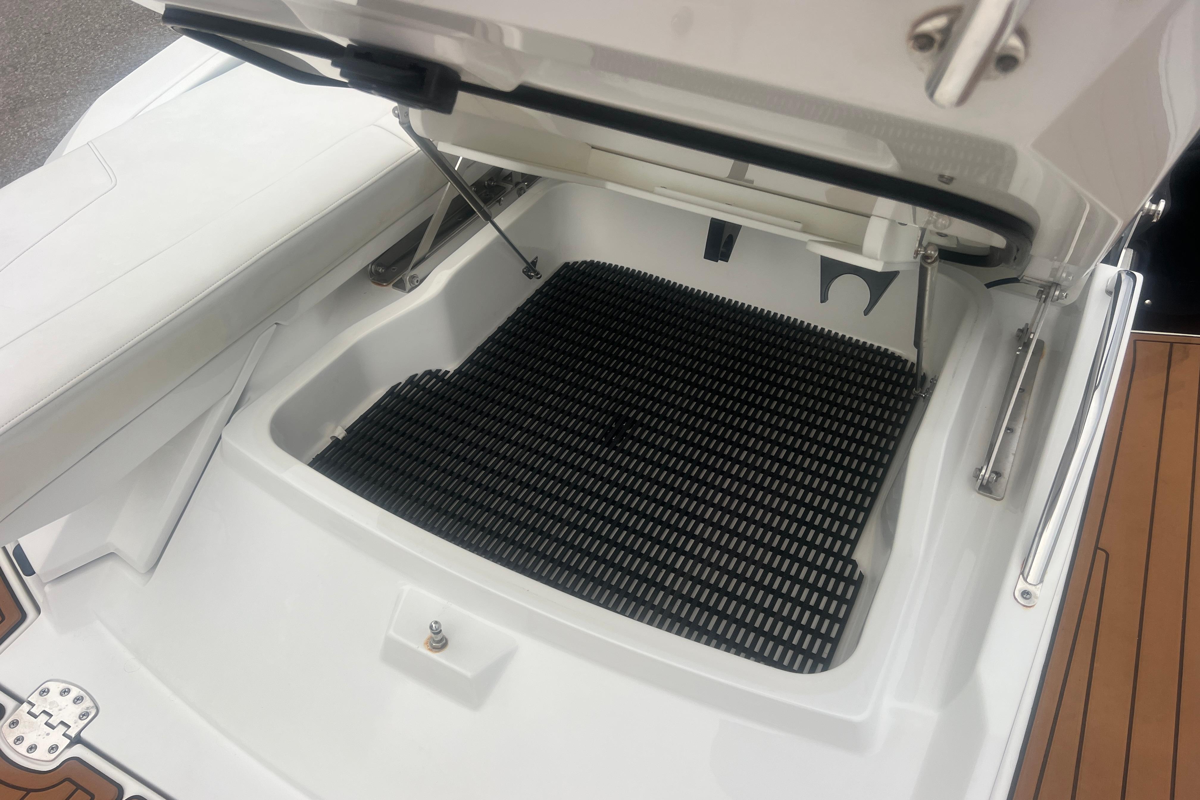 Open storage compartment on a 2017 Monterey 298SS Super Sport boat.