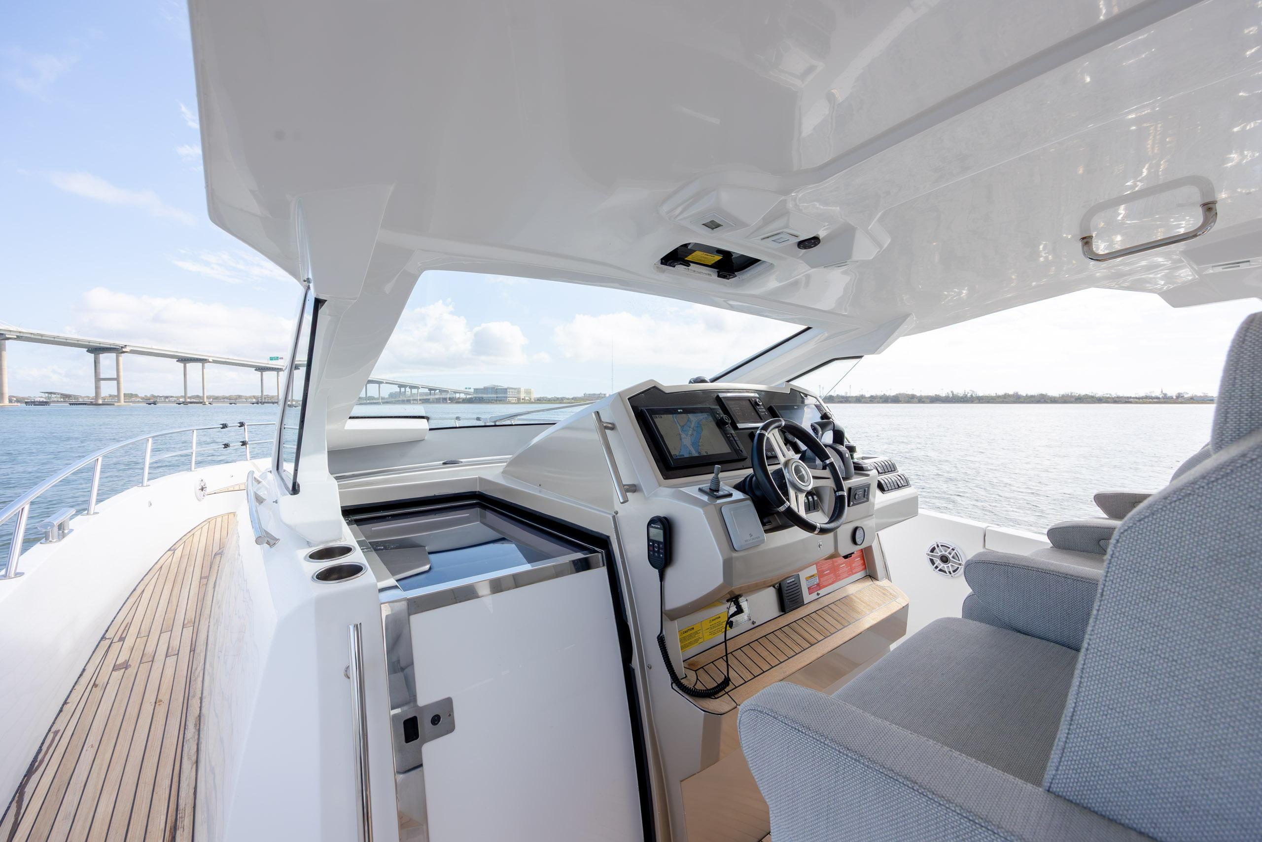 2019 Azimut Verve 40 yacht cockpit with modern navigation system and ocean view.