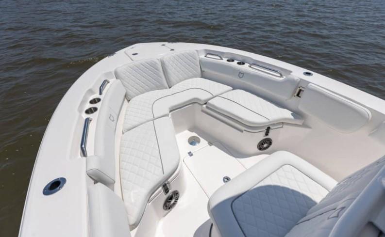 Luxurious seating on 2026 Sea Fox 228 Commander boat, featuring elegant white upholstery.