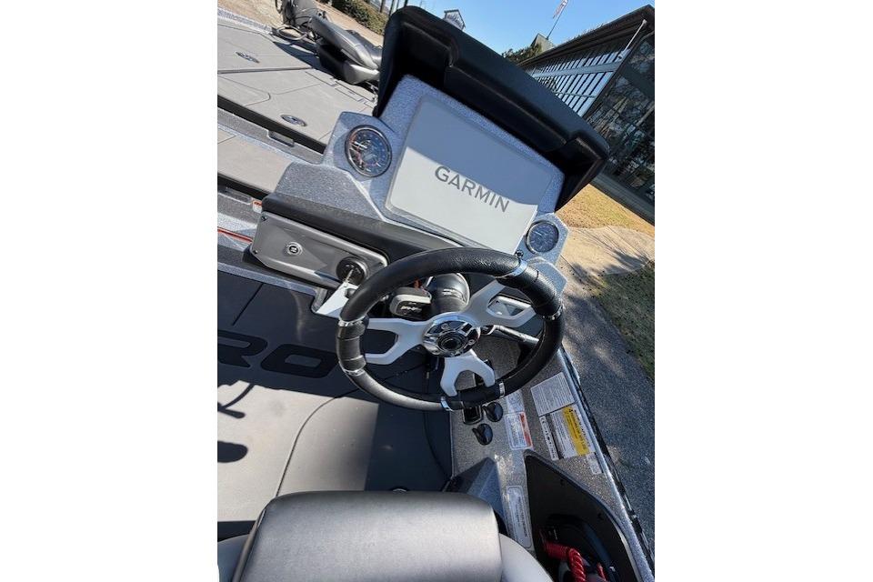 2026 Nitro Z20 XL Pro boat dashboard with Garmin navigation system and steering wheel.