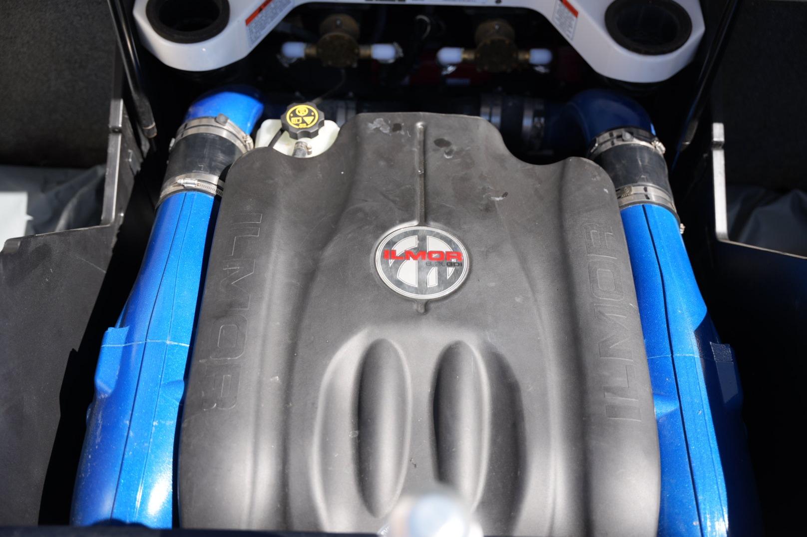 2020 MasterCraft X22 engine with Ilmor branding and blue hoses.
