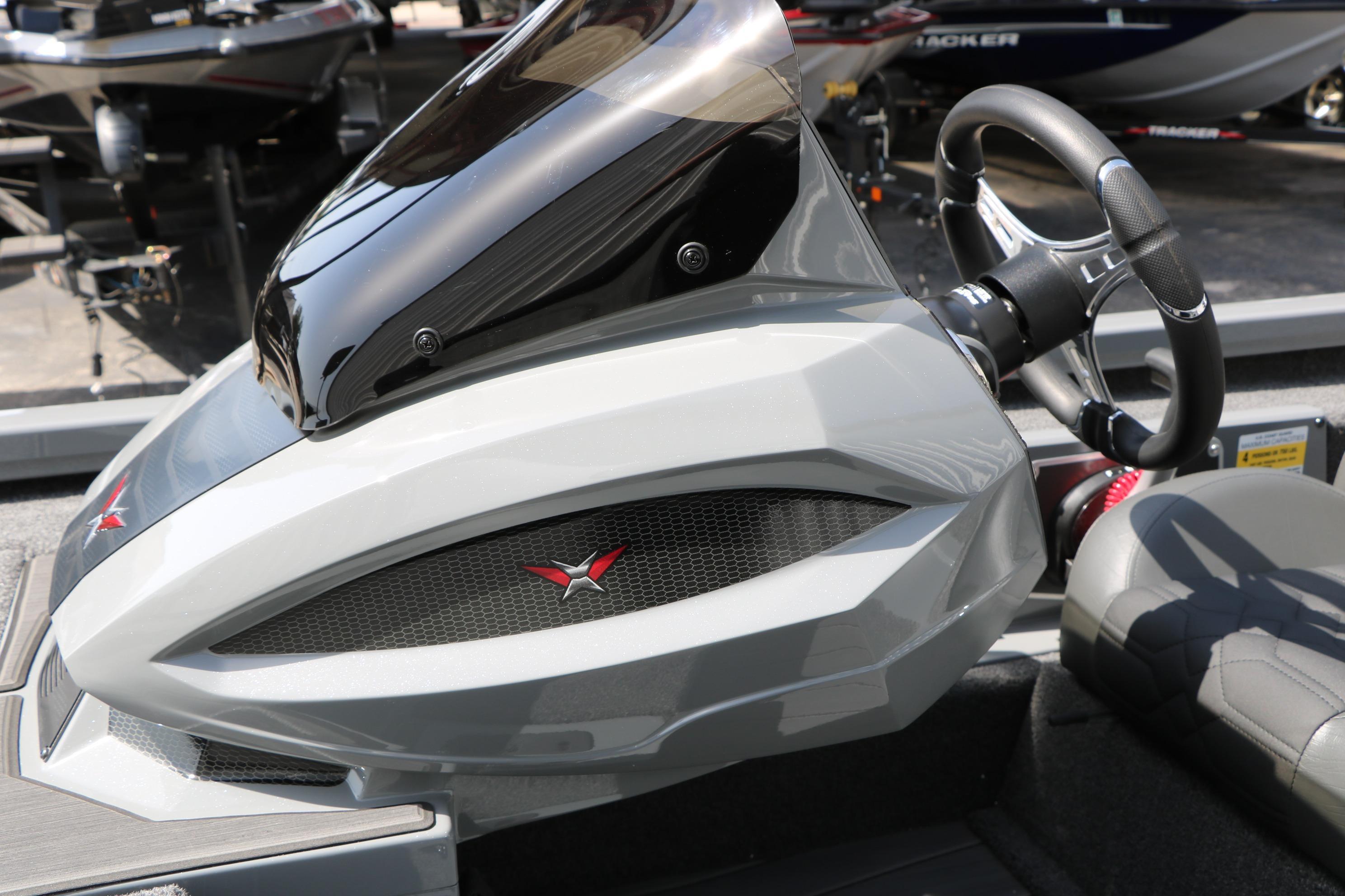 2026 Vexus AVX1980 boat dashboard with steering wheel and sleek design.