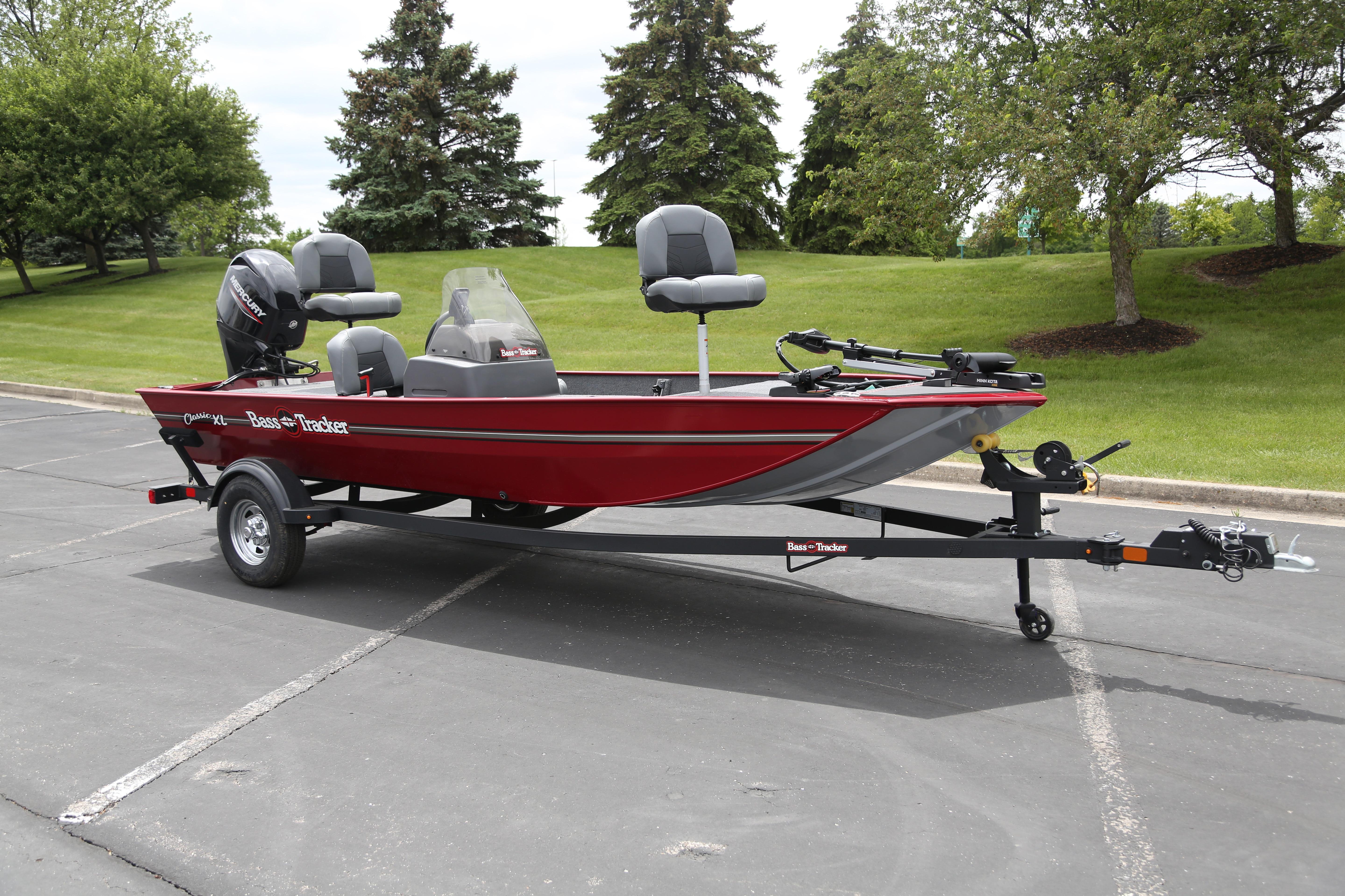 2026 Tracker Bass Tracker Classic XL boat on trailer, parked outdoors.