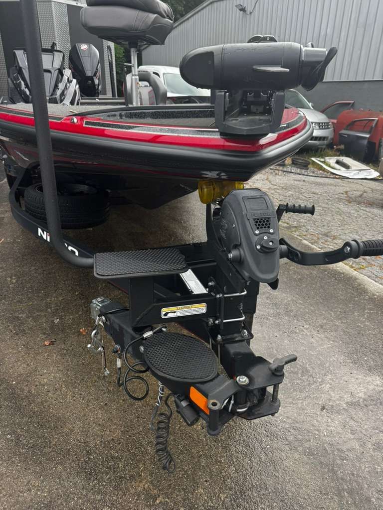 2022 Nitro Z21 XL Pro boat with trailer hitch on parking lot.