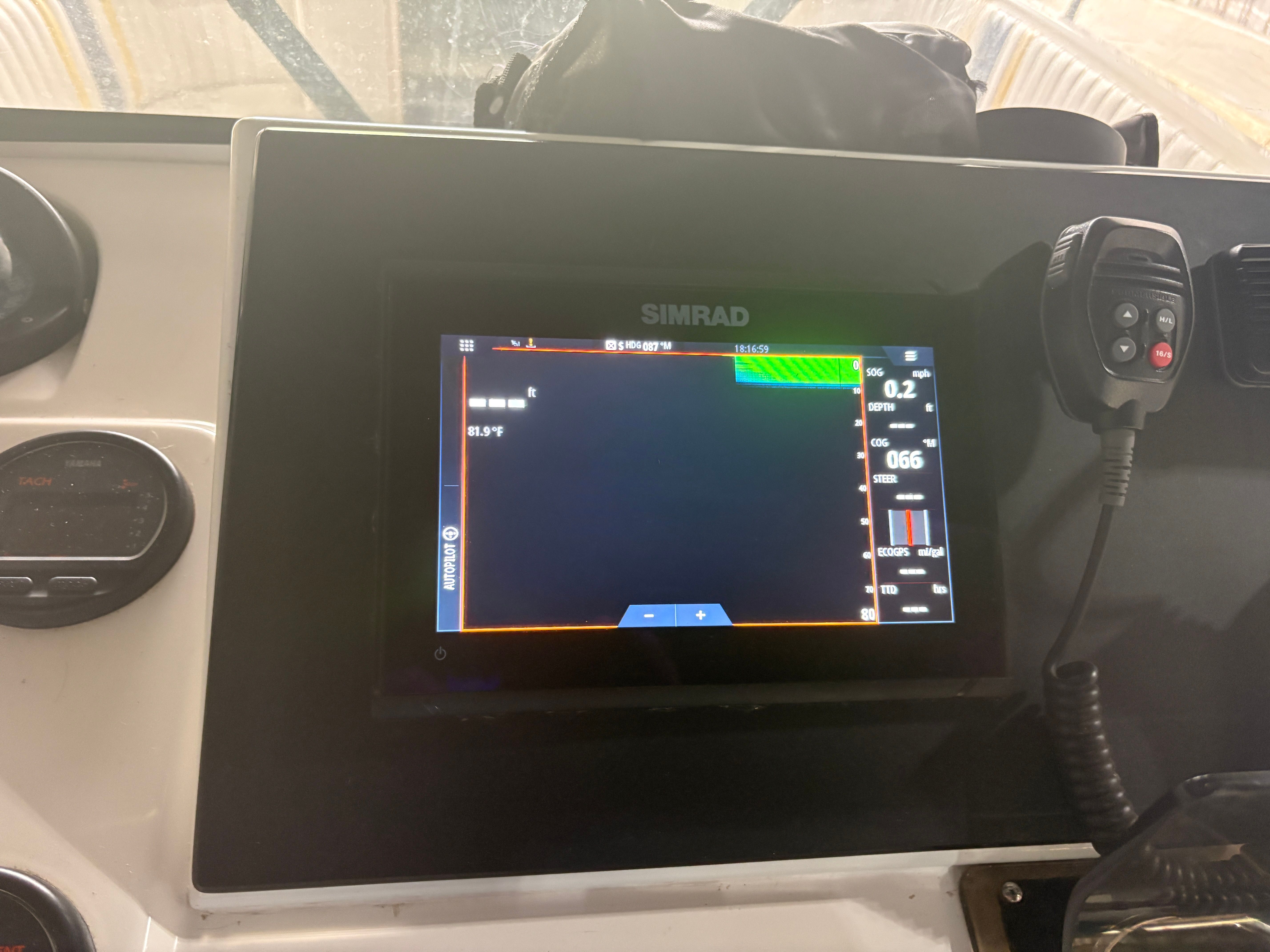 Simrad display on Intrepid 322 Cuddy Center Console, 2002 model.