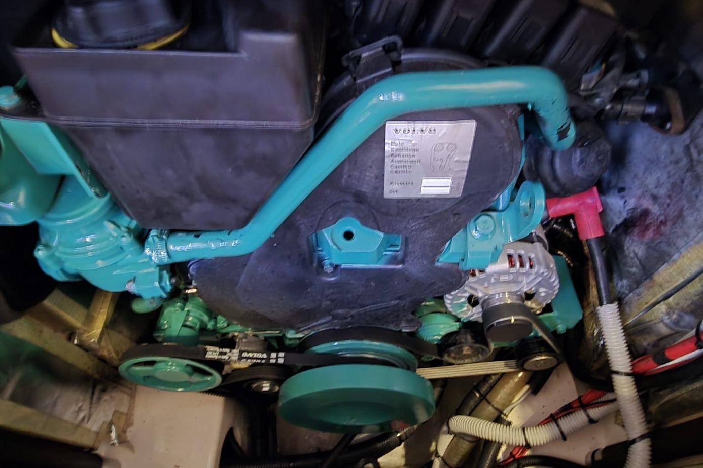 Engine compartment of a 2015 Hanse 575 sailboat, featuring a Volvo Penta engine.