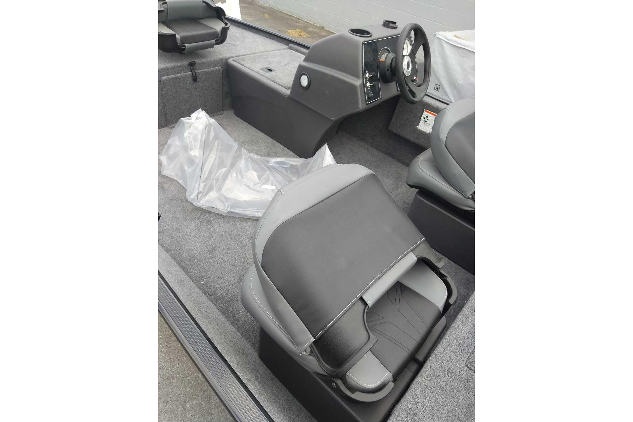 2026 Tracker Bass Tracker Classic XL boat interior with steering console and seating.