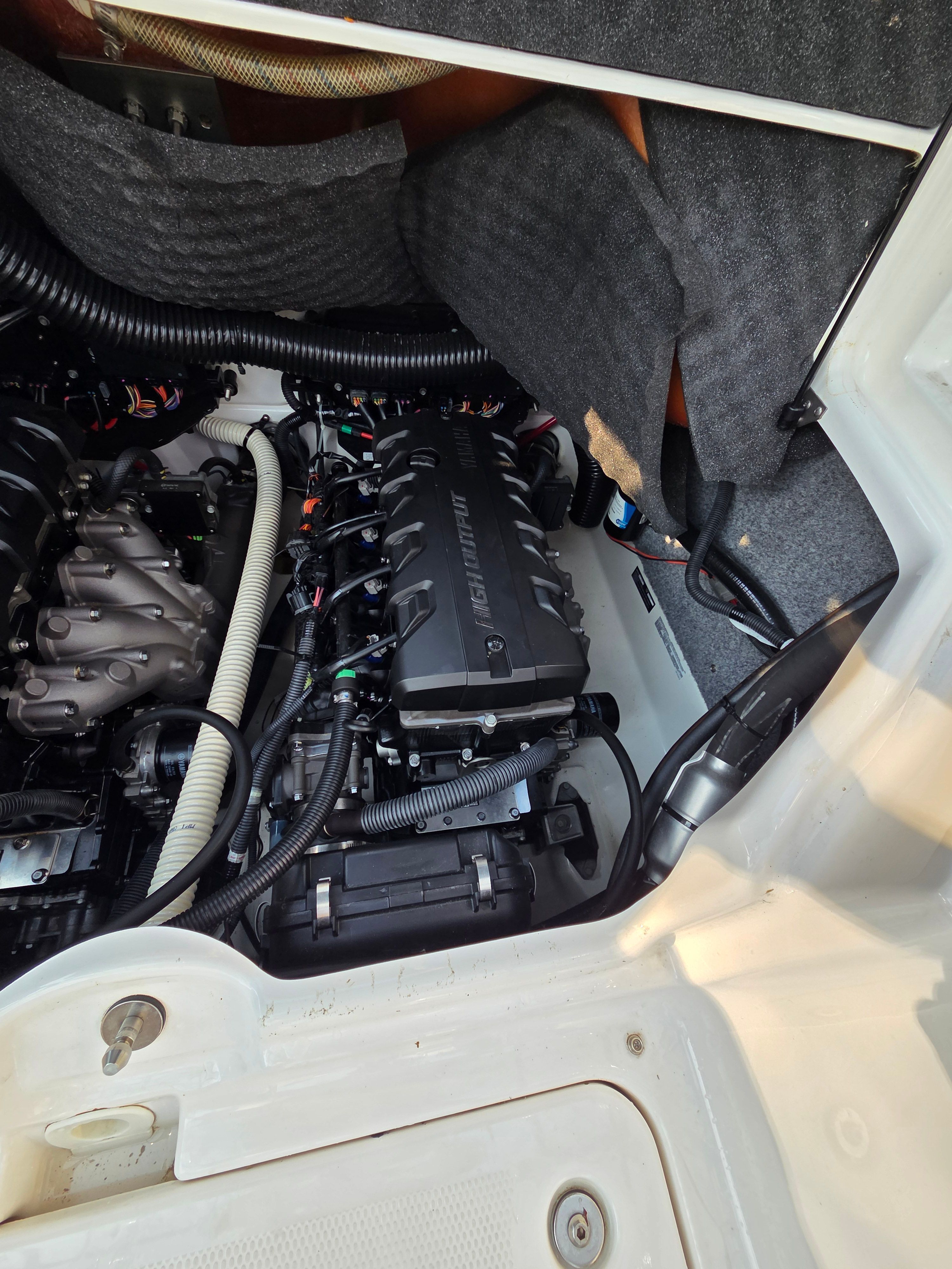 Engine compartment of a 2016 Yamaha 242X E-Series boat.