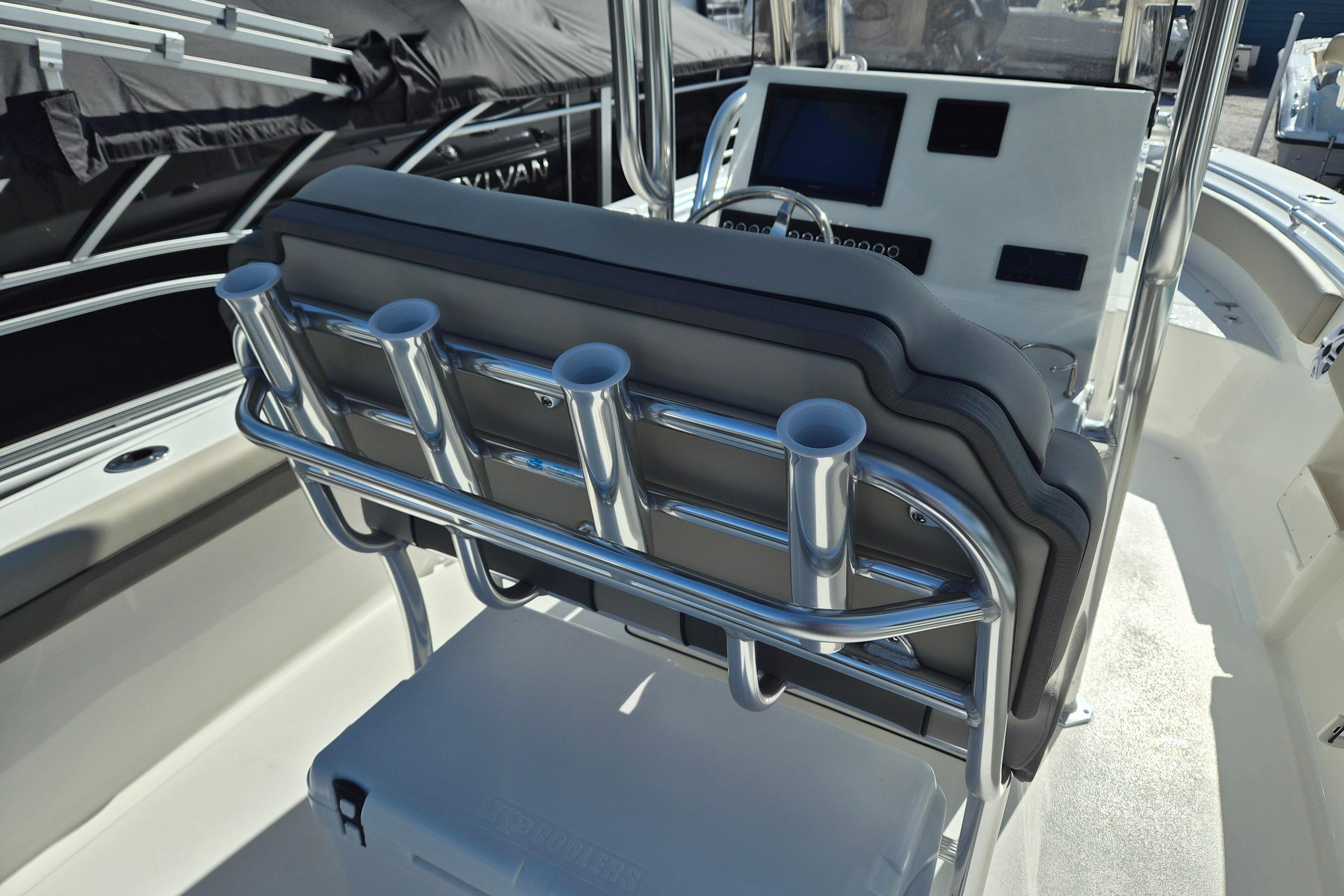 2026 Key West 239 FS boat interior with rod holders and console.