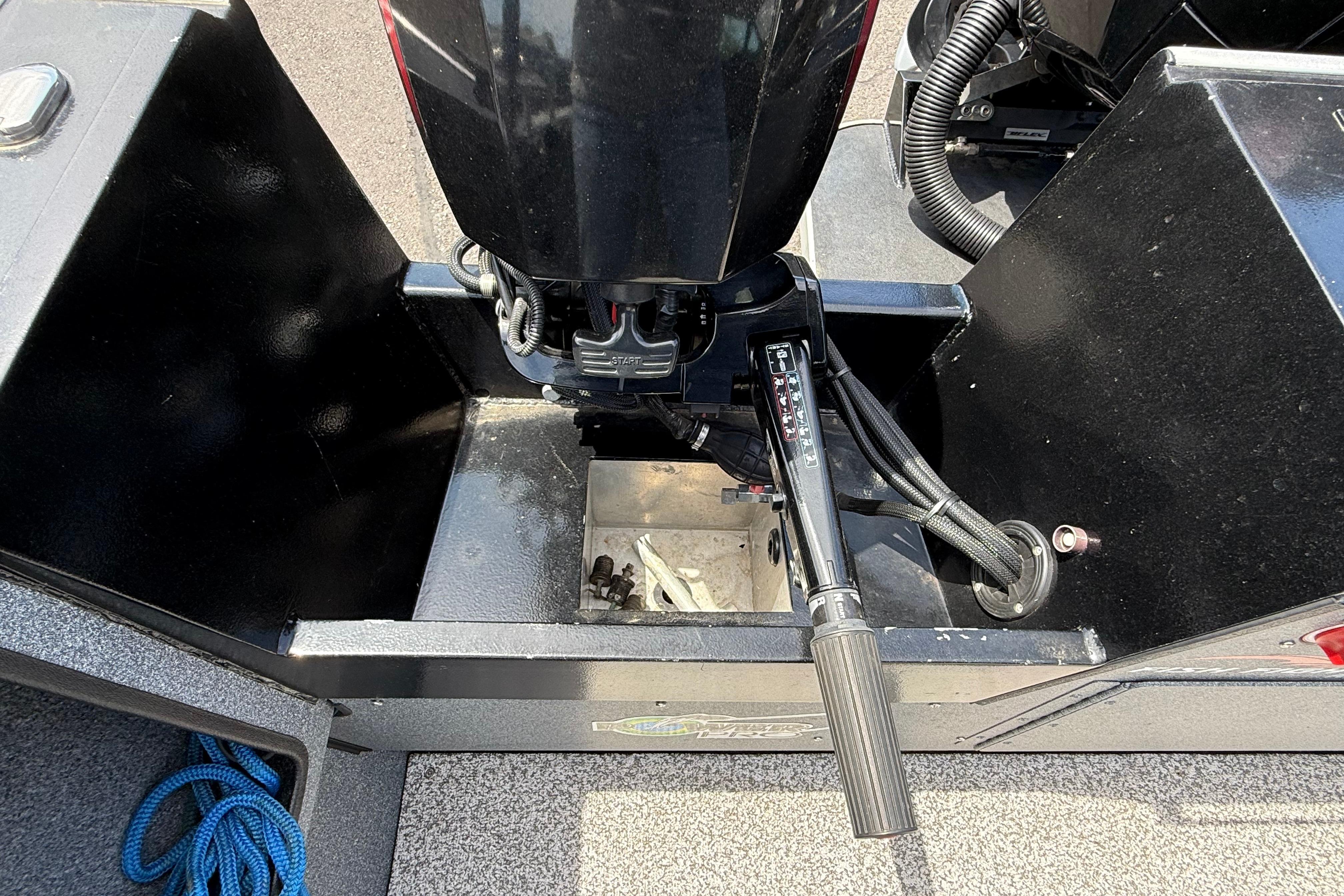 2019 Alumaweld Intruder Hard Top 22' boat engine compartment with visible controls.