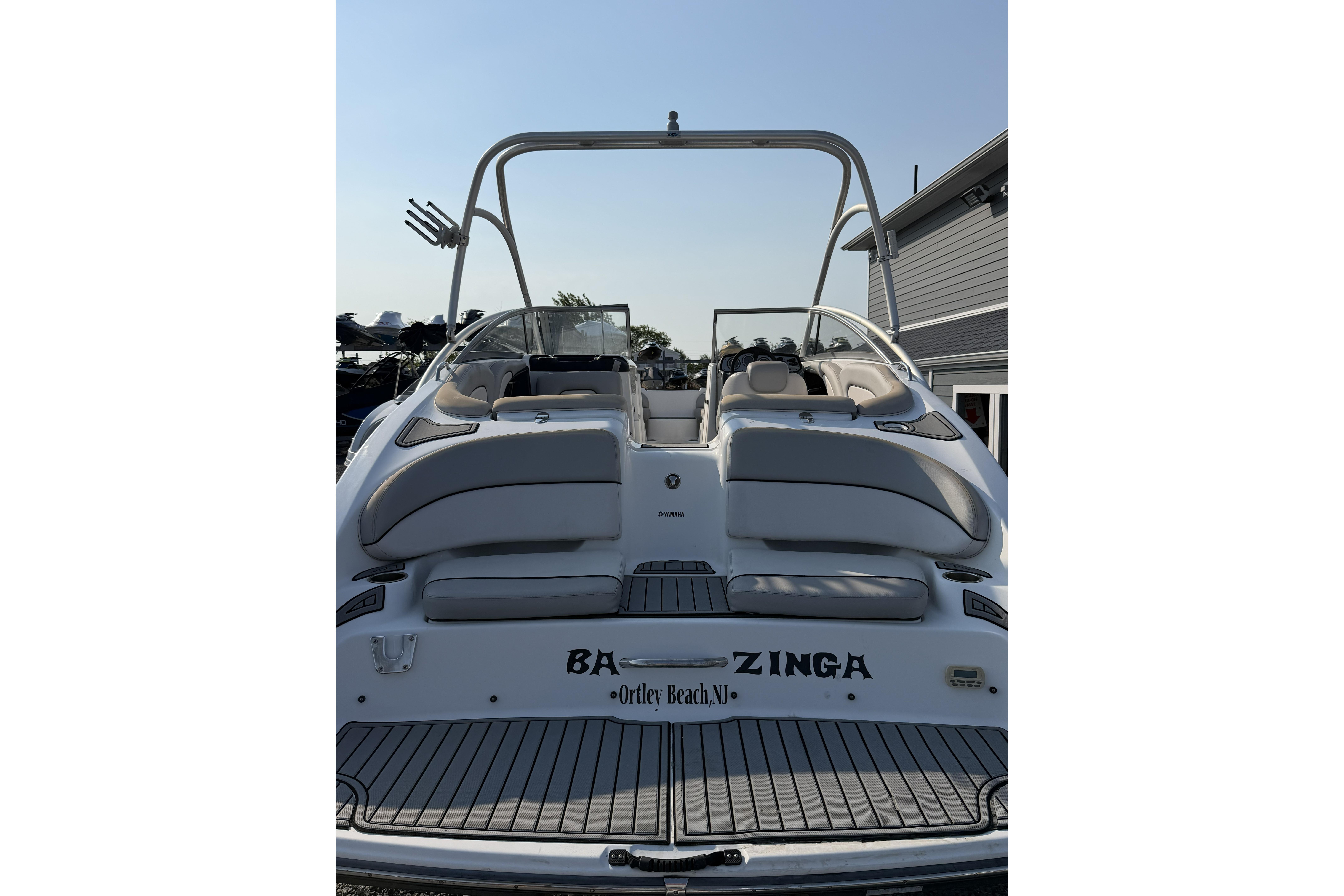 2011 Yamaha Boats AR240 HO with sleek seating and swim platform, docked at Ortley Beach, NJ.