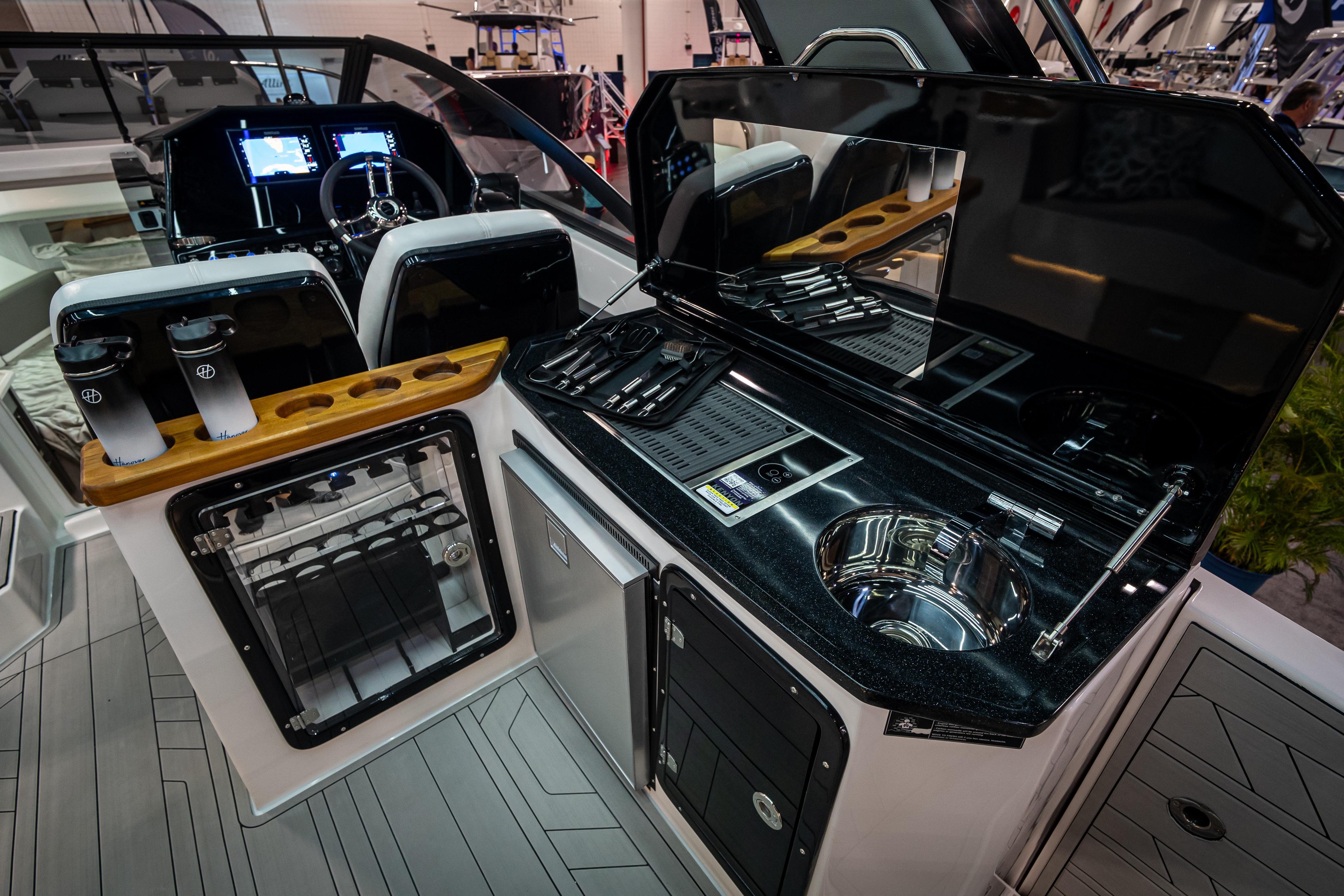 Luxurious Hanover 347 yacht interior with modern kitchen and navigation controls, 2026 model.