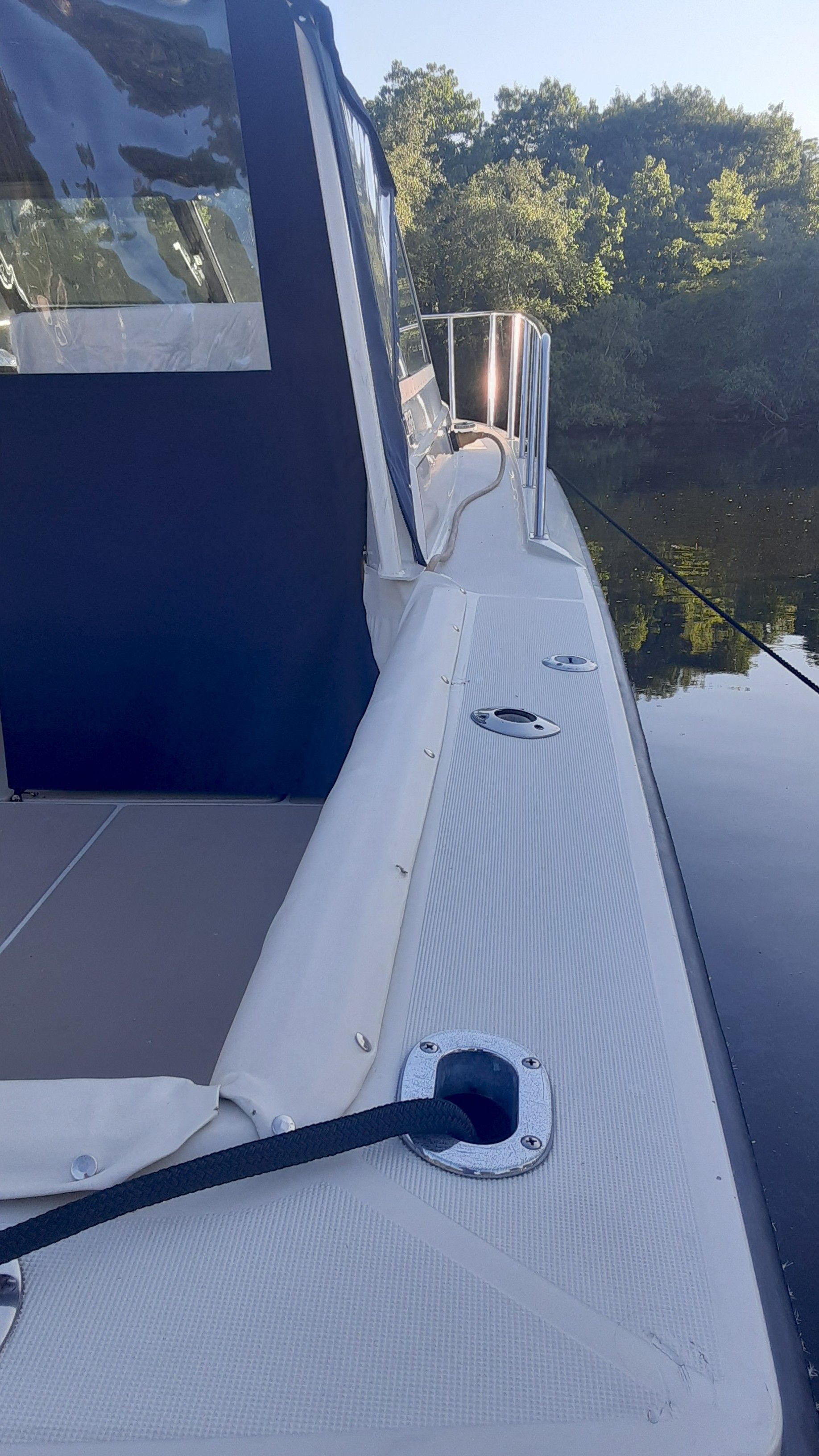 1985 Tiara Yachts 3100 Open on calm water.