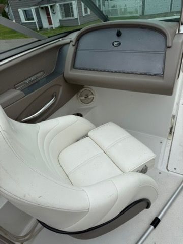 Interior view of a 2001 Cobalt 226 boat with a white seat and dashboard.