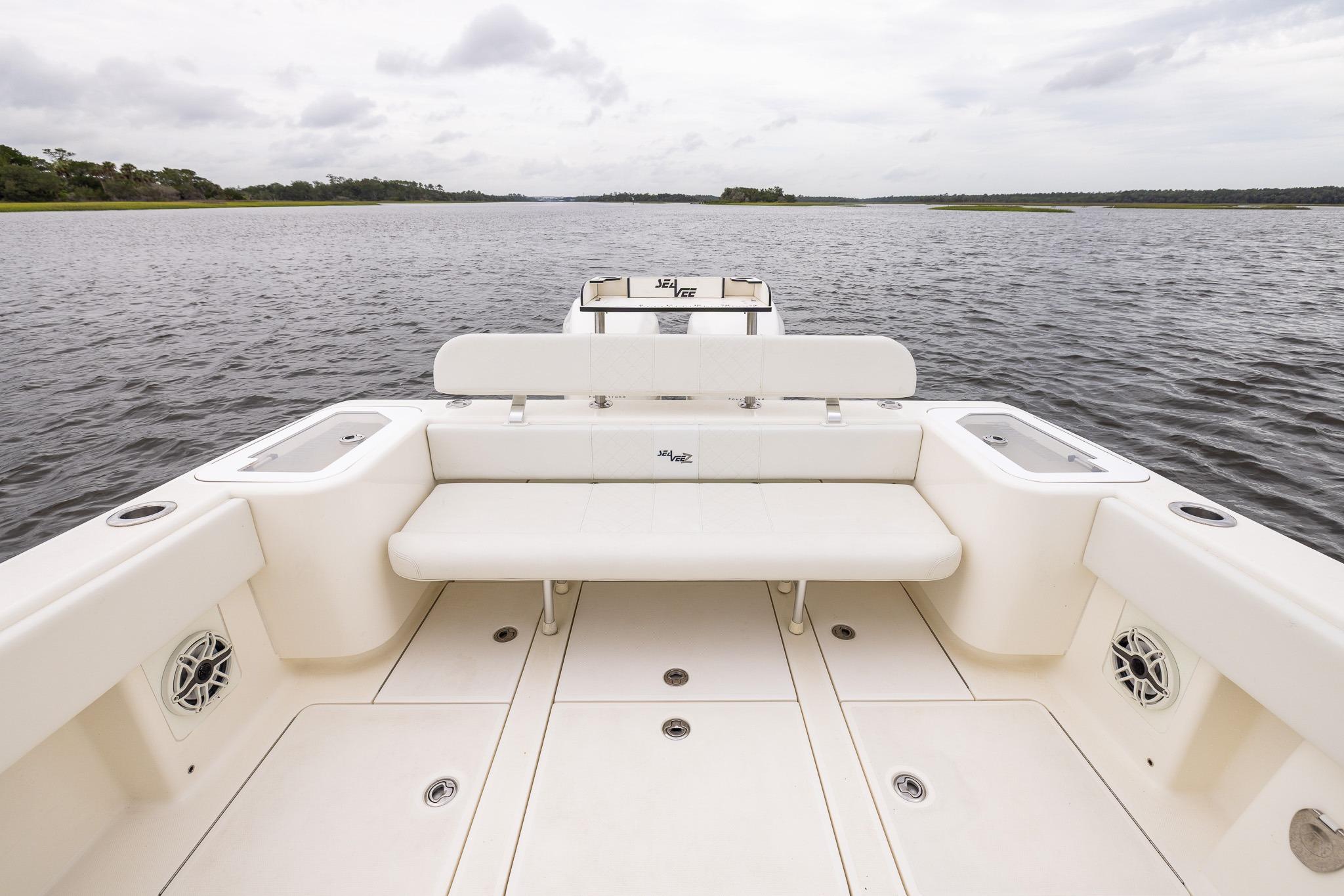 2019 SeaVee 322Z boat interior with seating, on calm water.