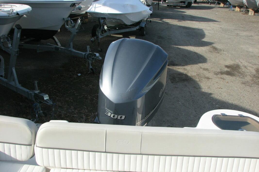 2020 Sea Fox 249 Avenger boat with Yamaha 300 outboard motor in a storage yard.