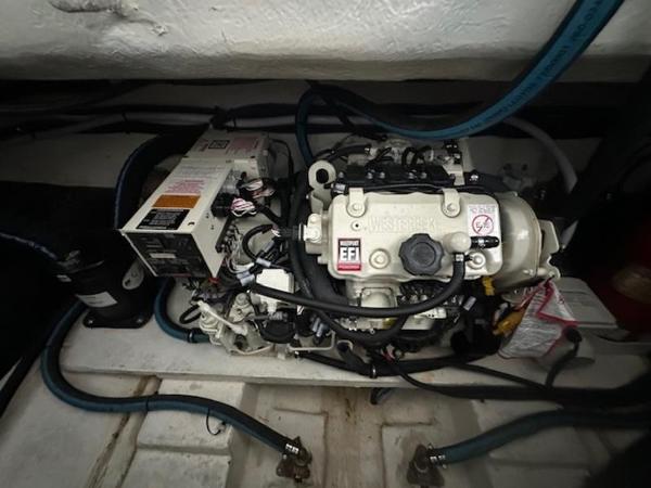 Engine compartment of a 2022 Cobalt A36BR boat, featuring a Westerbeke EFI engine.
