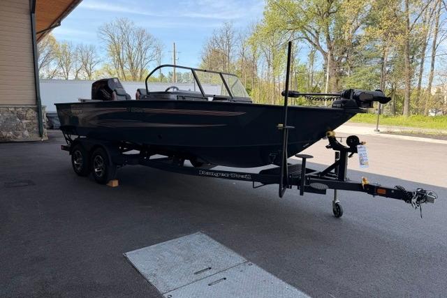 2026 Ranger VX1988 WT boat on trailer, parked outdoors near building.