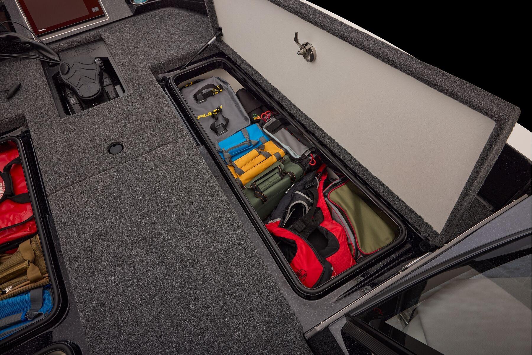 Manufacturer Provided Image: Storage compartment of 2026 Ranger 620xFS Pro boat, organized with fishing gear and equipment.